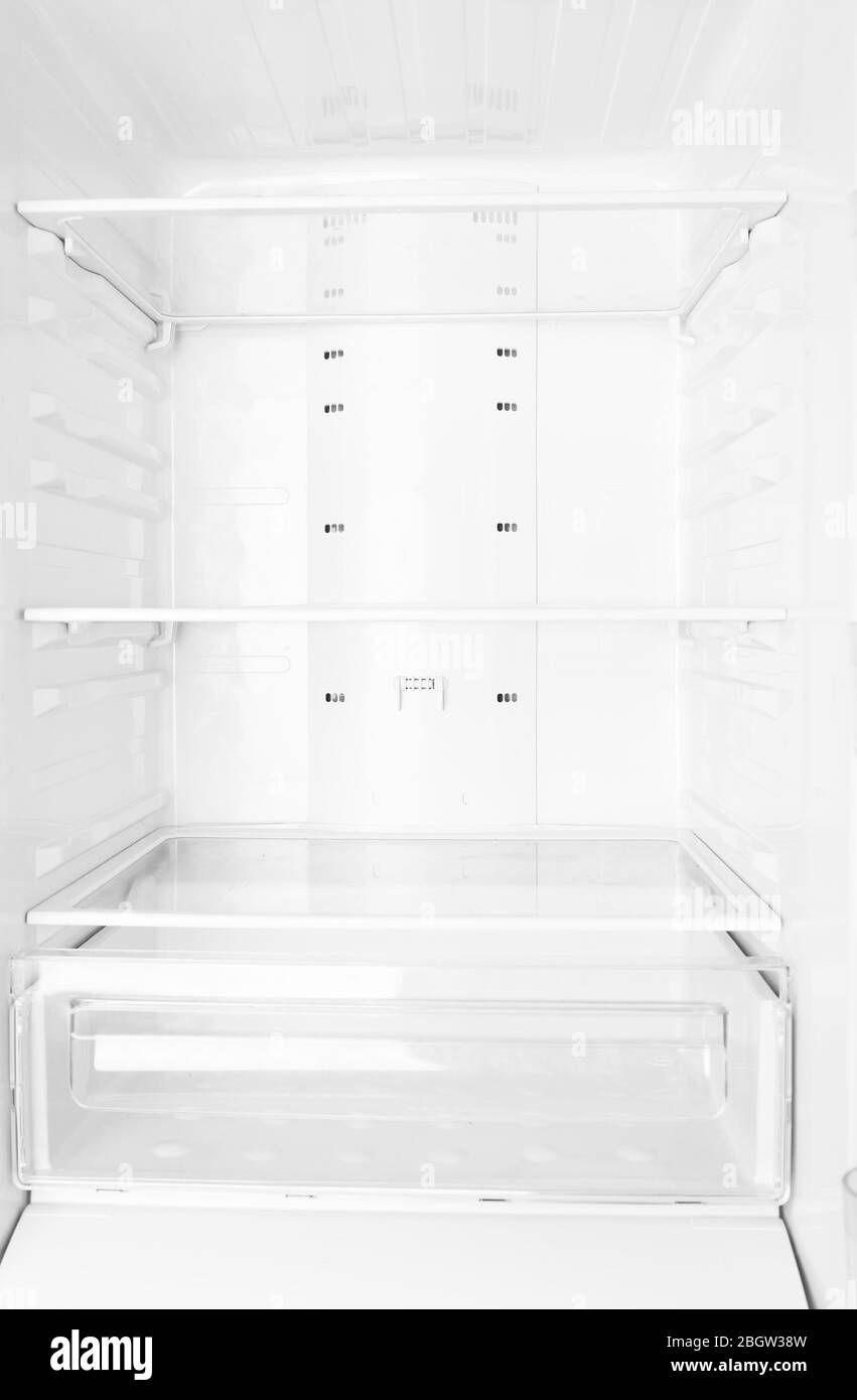 Empty refrigerator shelves closeup Stock Photo