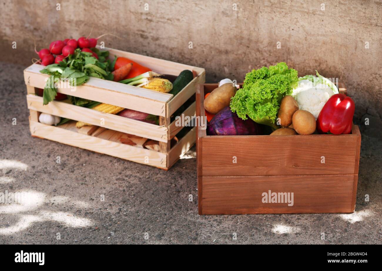 Fresh organic vegetables in wooden boxes outdoors Stock Photo - Alamy