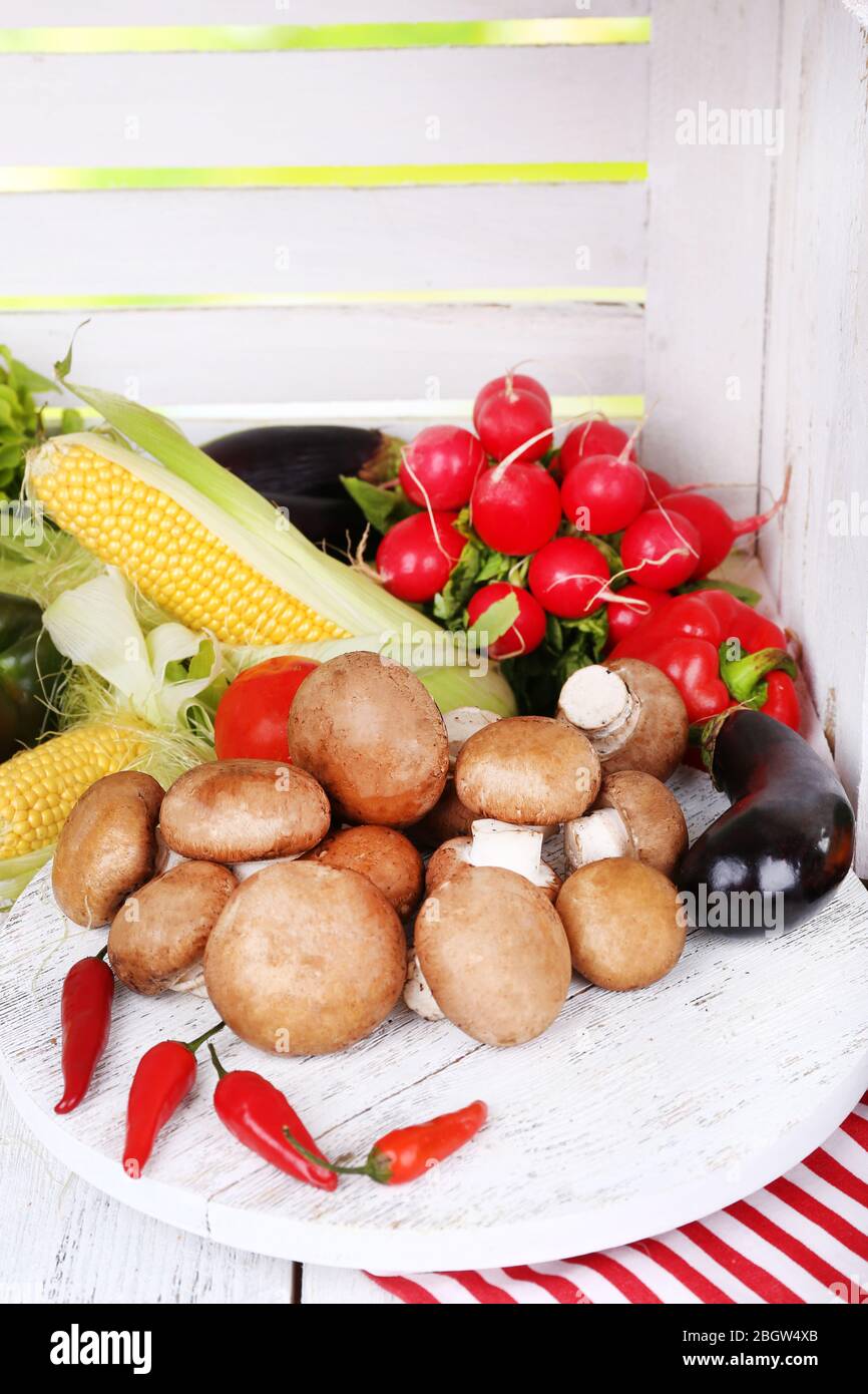 Vegetables on white wooden box background Stock Photo - Alamy