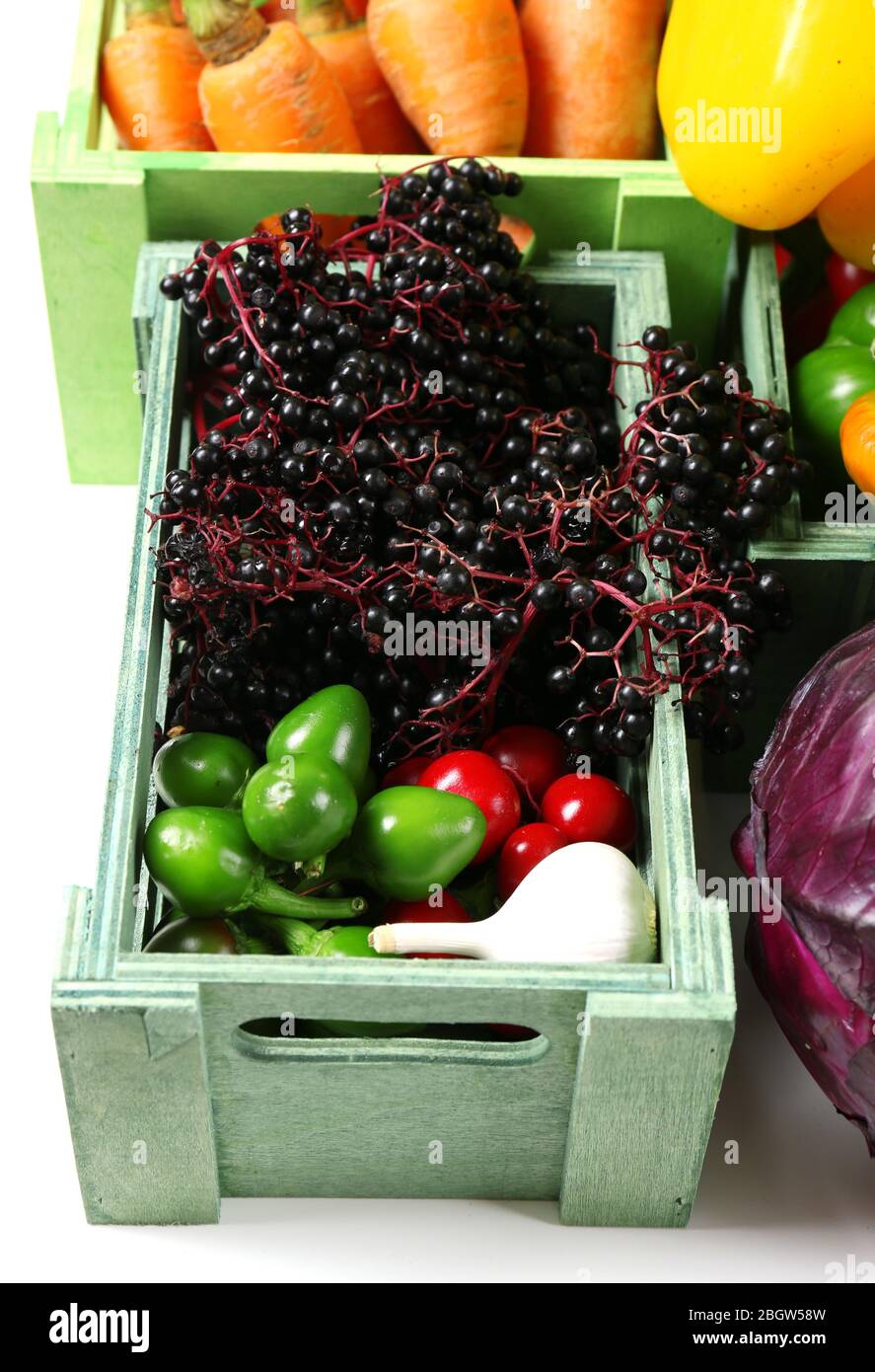 Fresh organic vegetables in wooden boxes, close up Stock Photo - Alamy