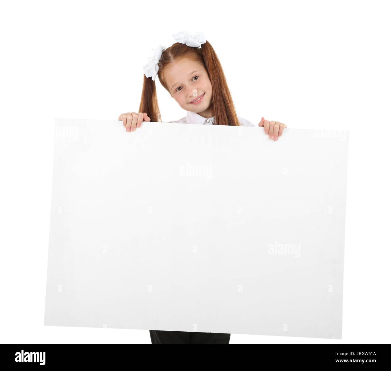 Beautiful little girl holding blank poster isolated on white Stock ...