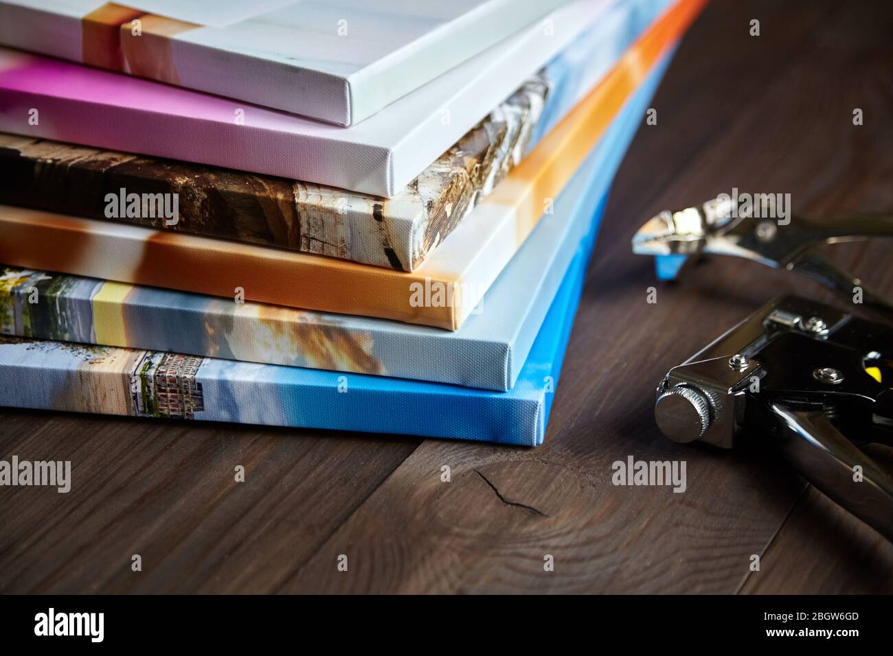 Photography canvas prints. Stack of colorful photos with gallery ...