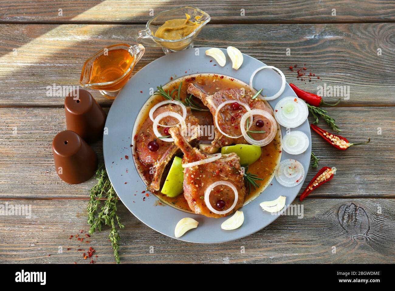 Preparing lamb chops Stock Photo - Alamy