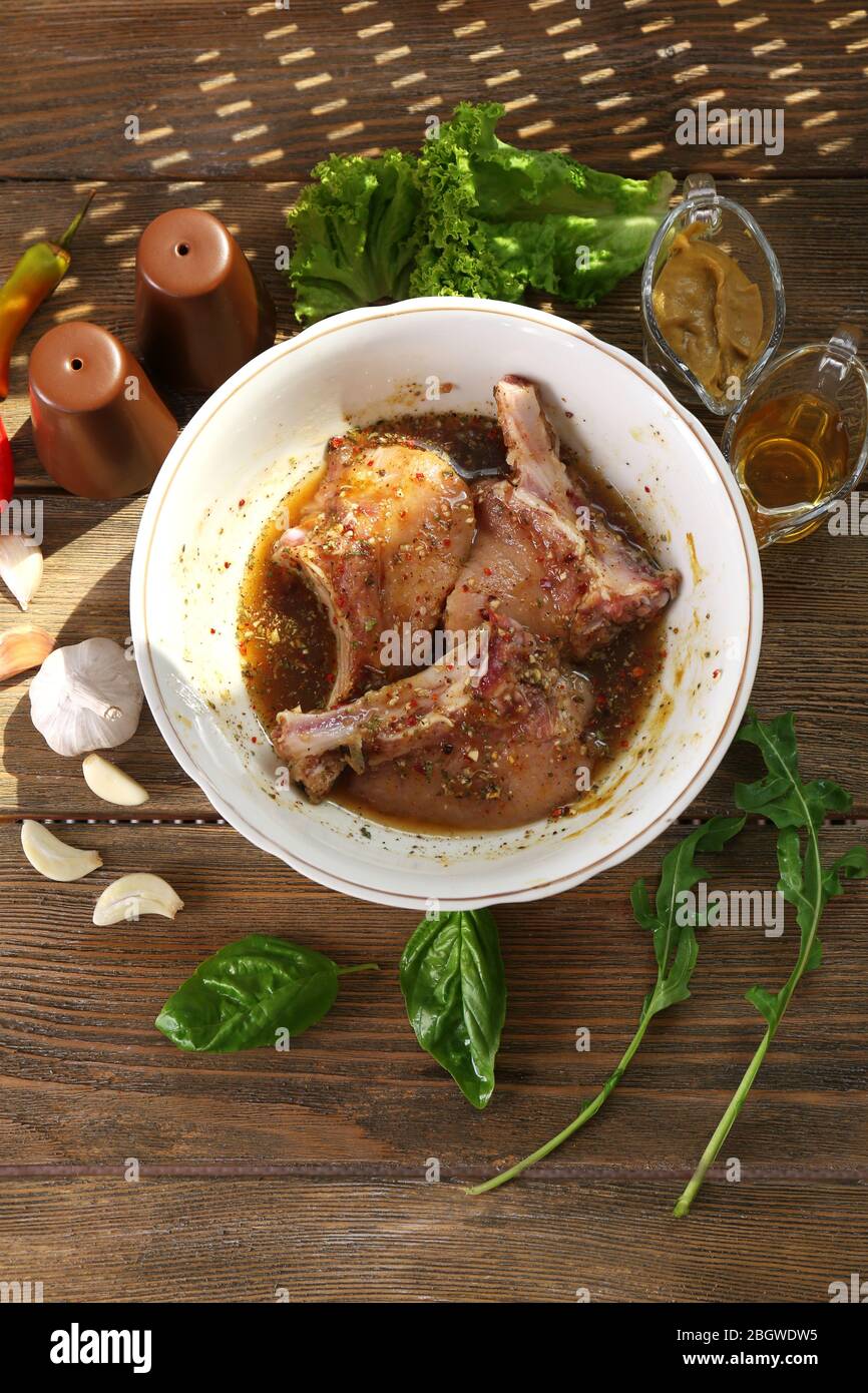 Preparing lamb chops Stock Photo - Alamy