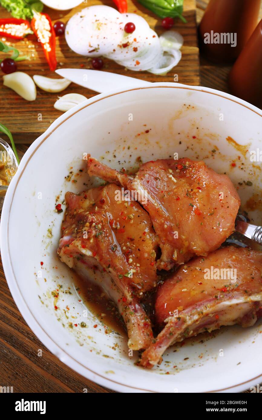 Preparing lamb chops Stock Photo - Alamy