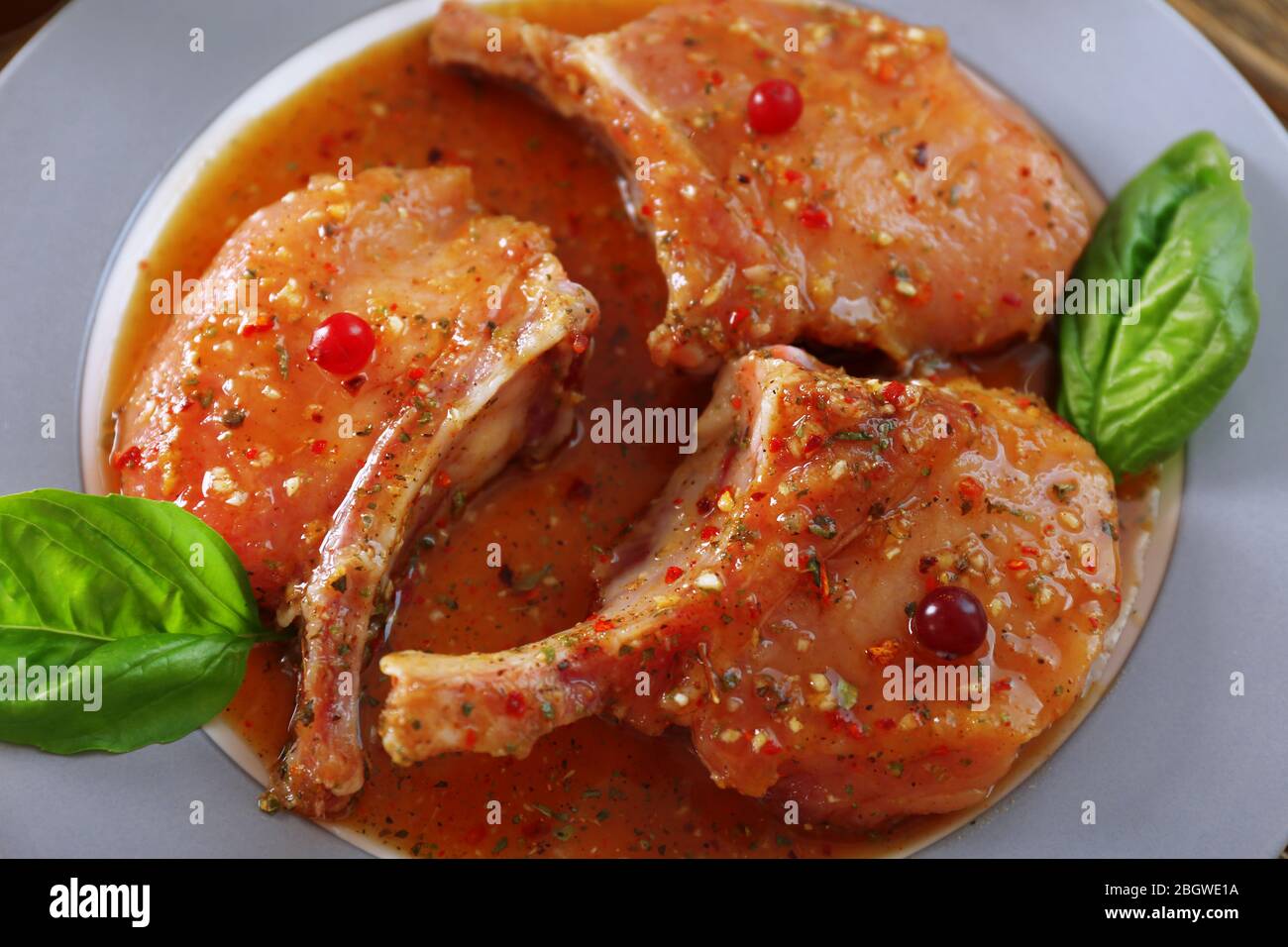 Preparing lamb chops Stock Photo - Alamy