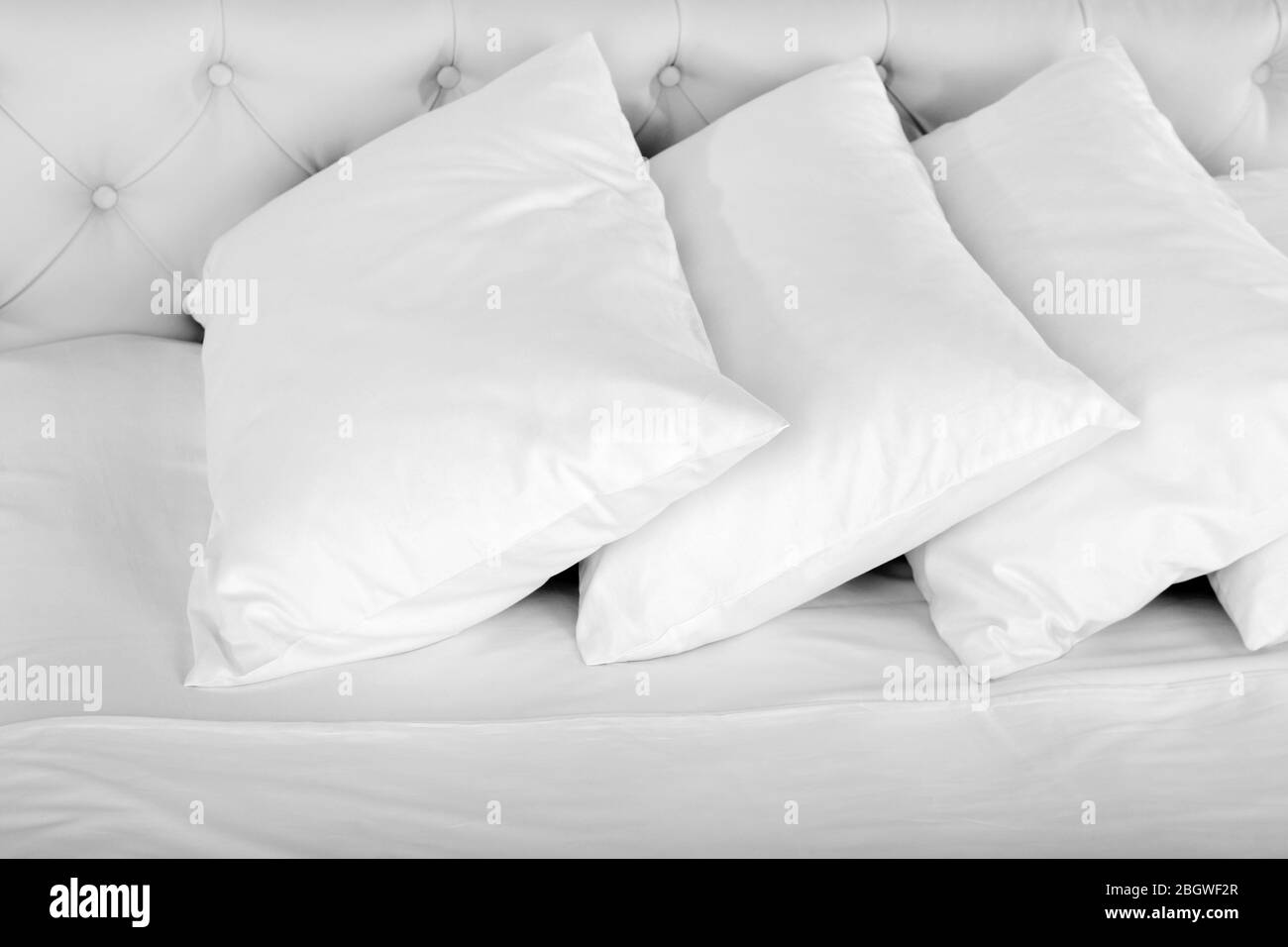 White pillows on bed close up Stock Photo Alamy