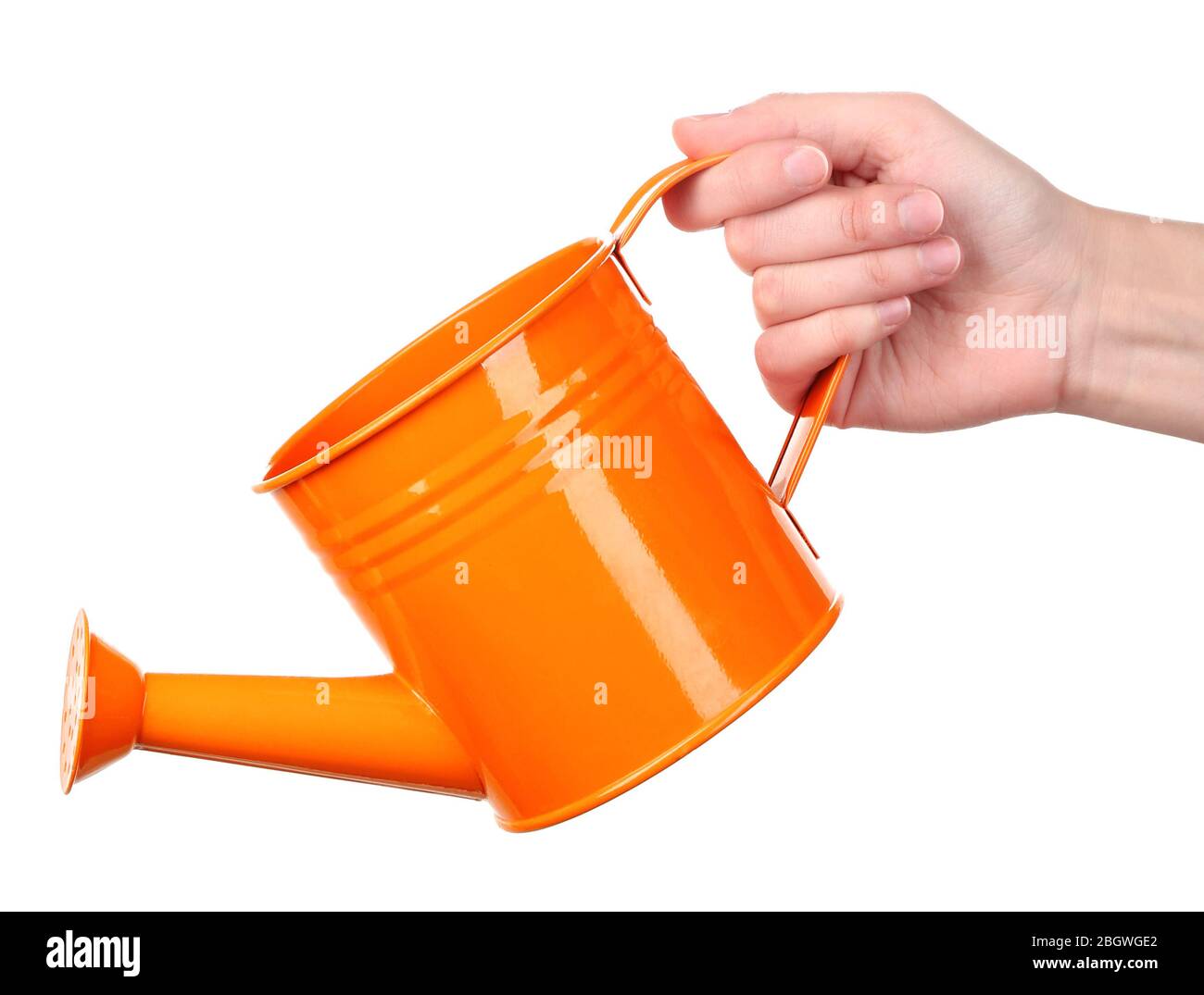 Water pouring from watering can isolated on white Stock Photo Alamy