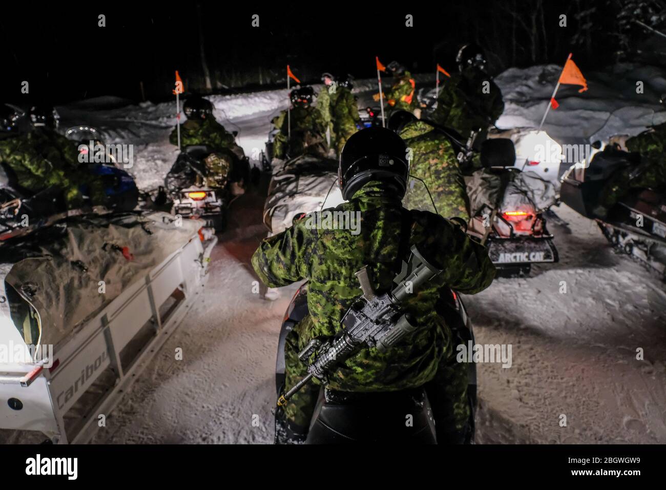 SAGUENAY, CANADA - JANUARY 15: soldiers in snowmobiles during a Franco-Canadian military exercise, Quebec, Saguenay, Canada on January 15, 2017 in Sag Stock Photo