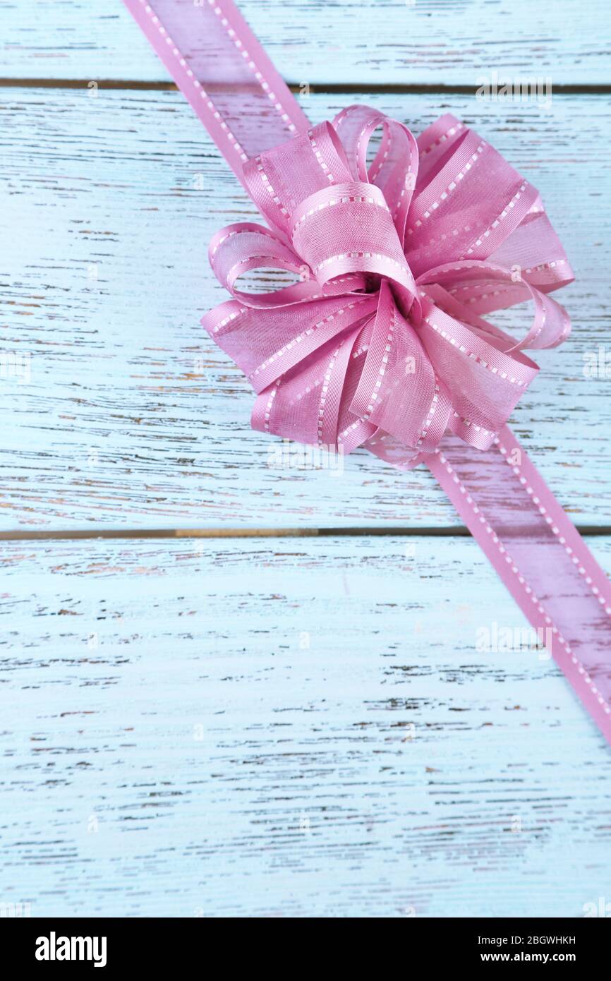 Old wooden background with beautiful bow Stock Photo - Alamy