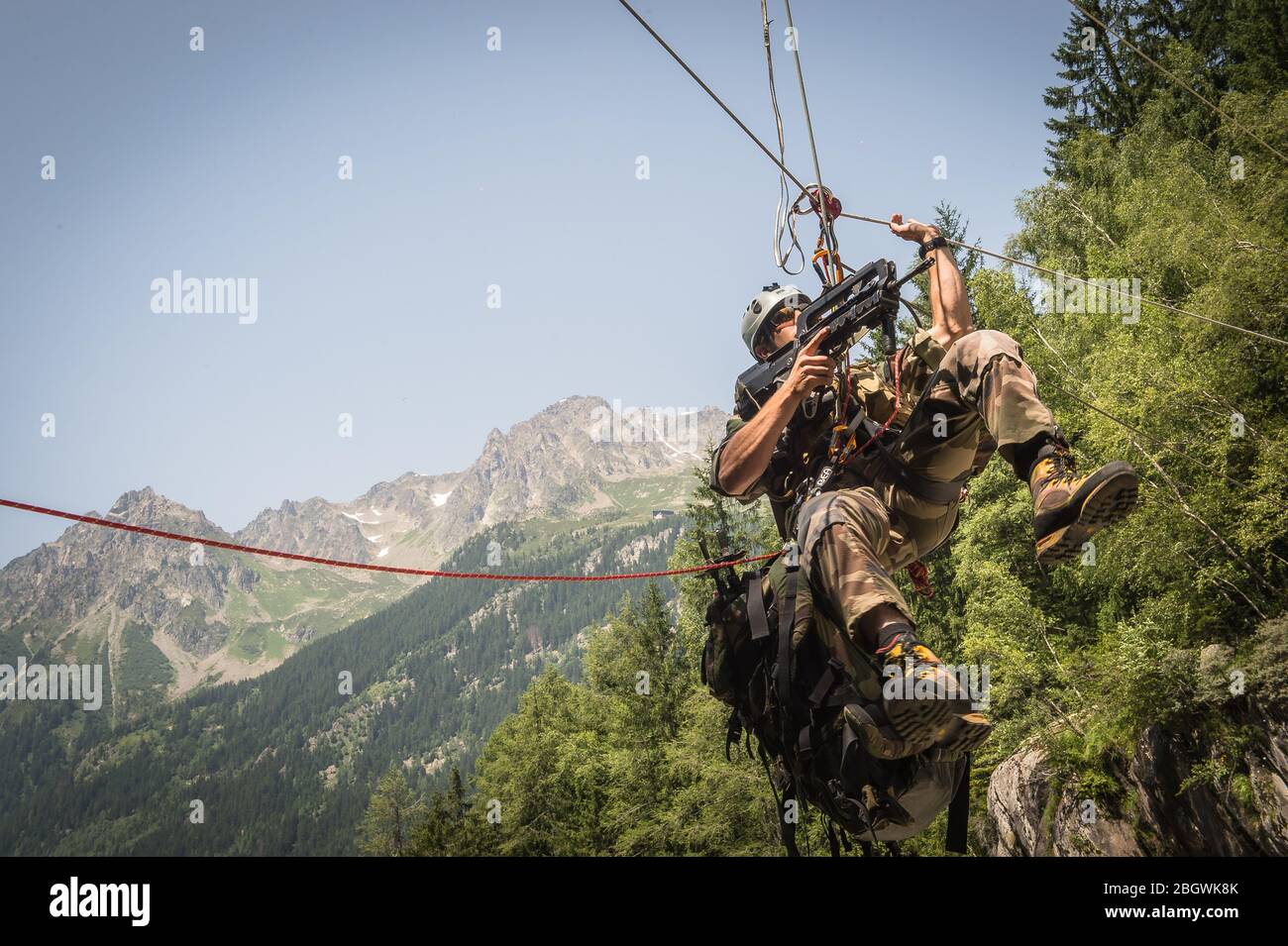 CHAMONIX, FRANCE JULY 02 a soldier doing a zipline exercise with the