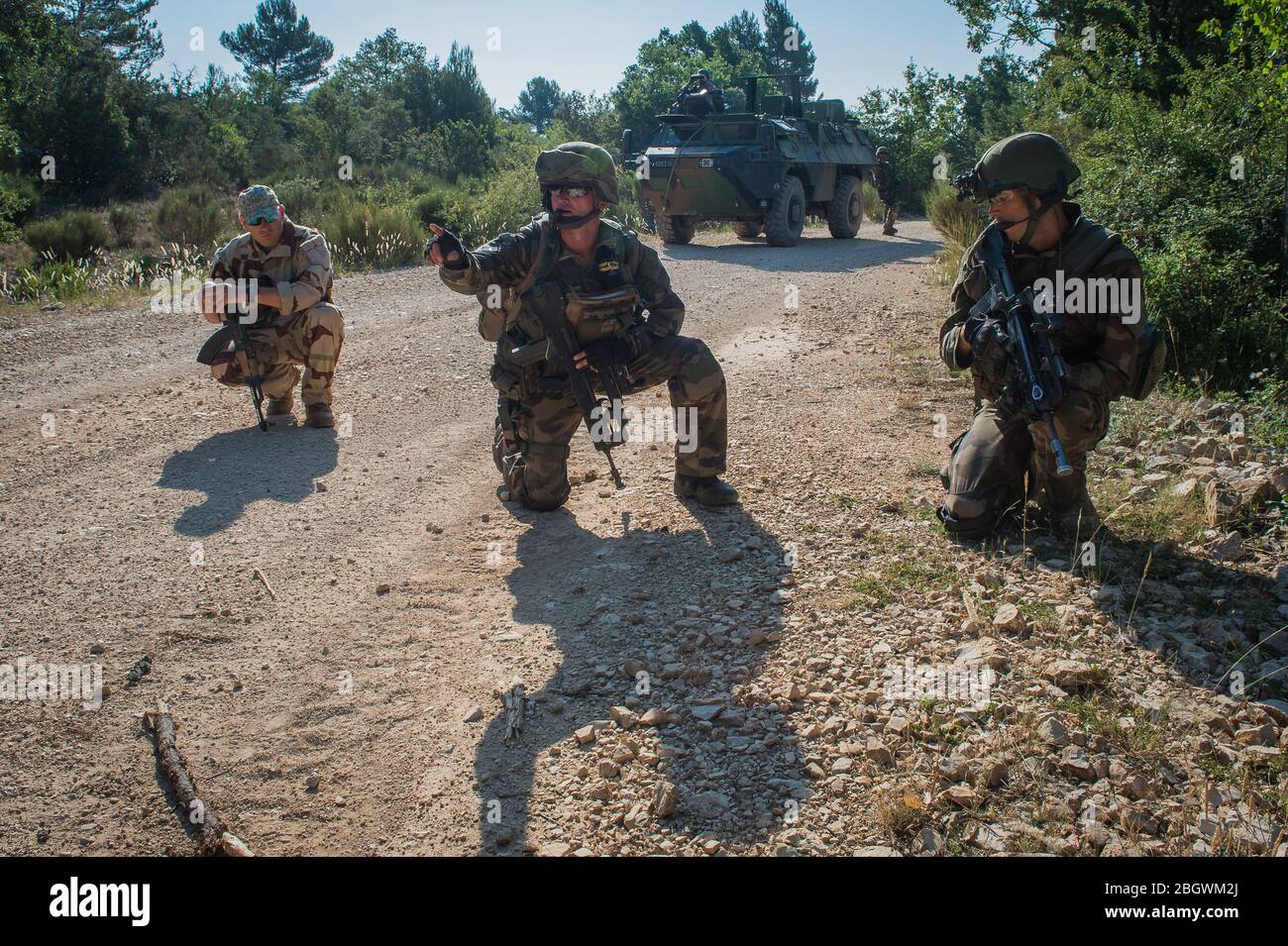 DRAGUIGNAN, FRANCE - JULY 21: simulation of conflict between soldiers and terorists with fake corpses, fake terrorists and fake wounds during the prep Stock Photo
