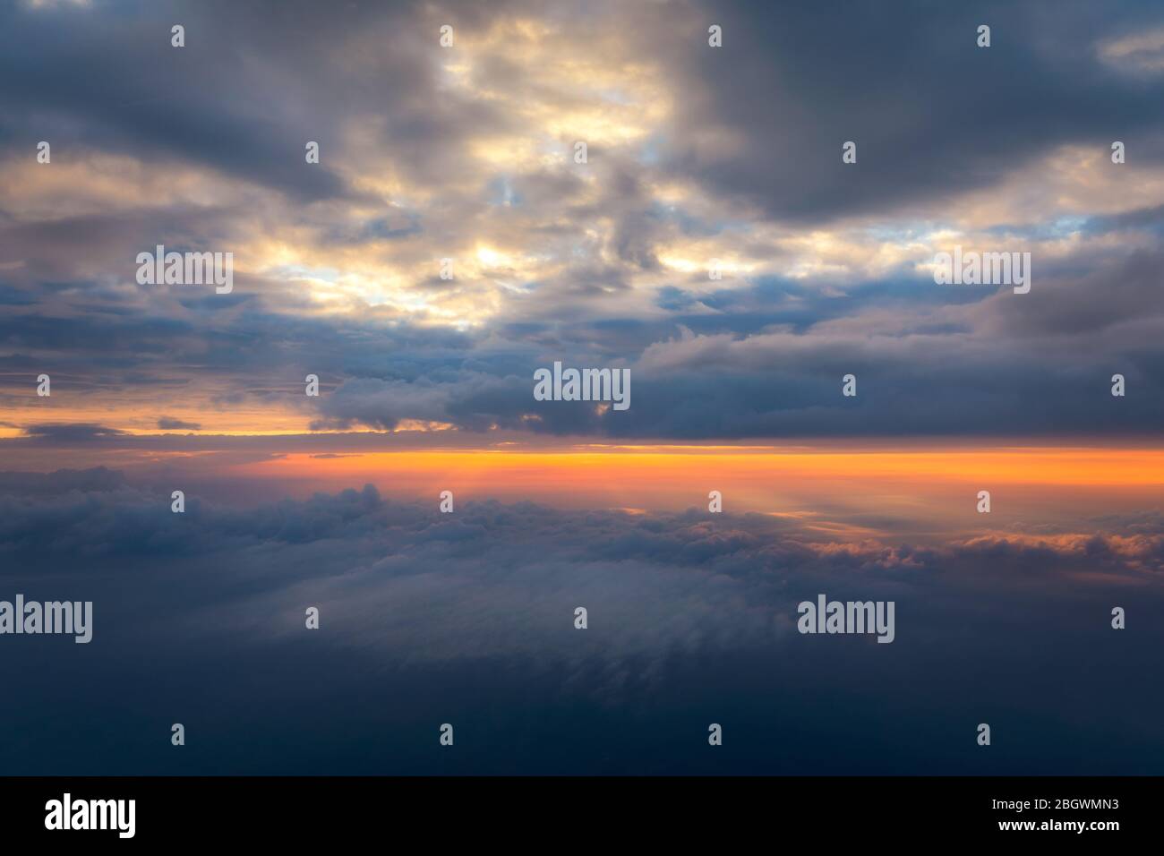 Beautiful sunset sky above clouds with dramatic light. Cabin view from ...