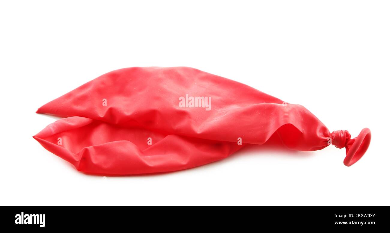 Popped red balloon isolated on white Stock Photo