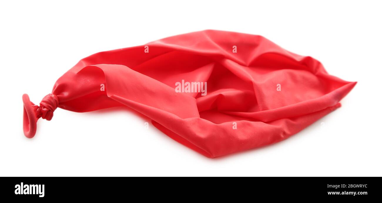 Popped red balloon isolated on white Stock Photo
