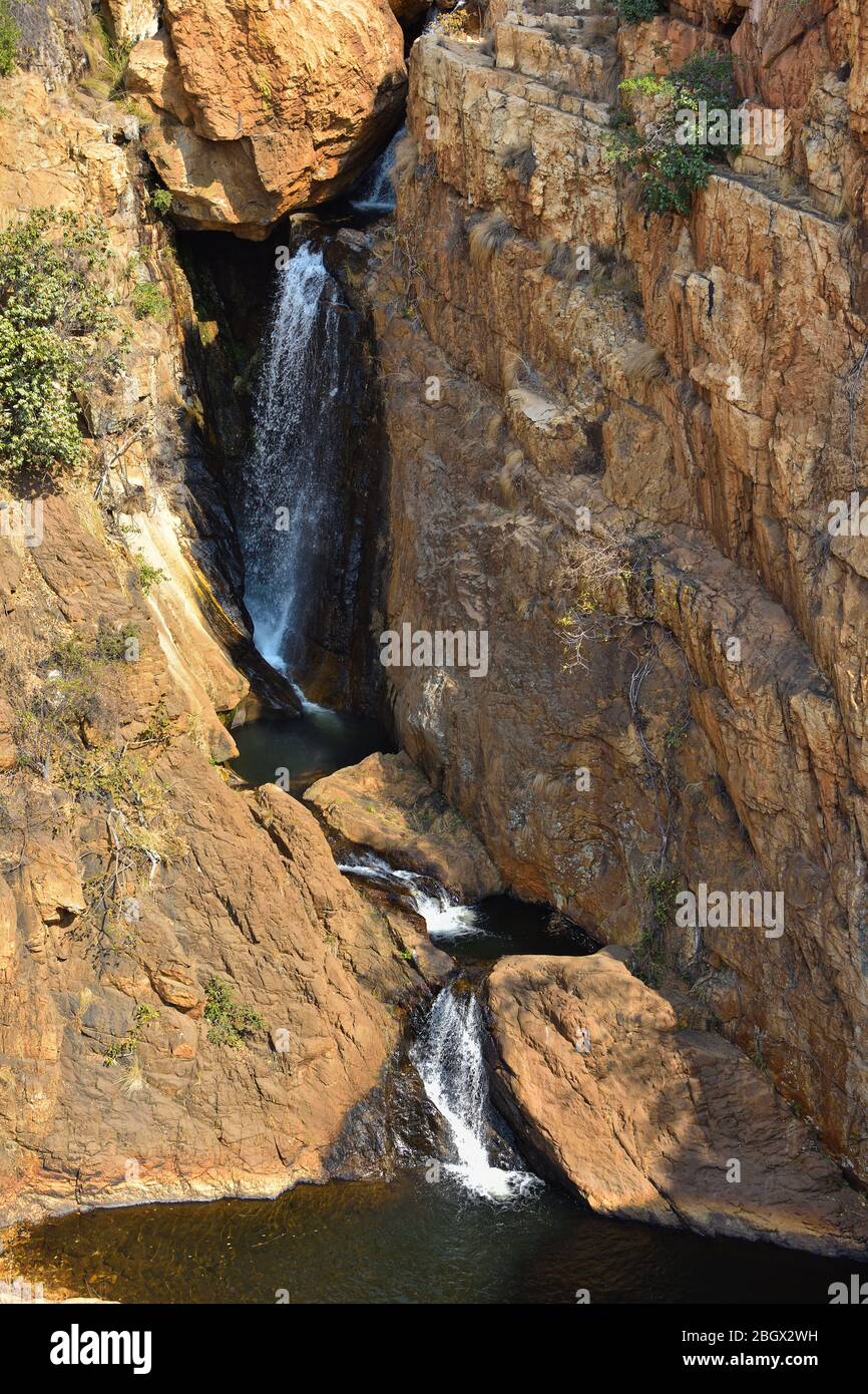 Rocky Cliffs Waterfall Cascade With Pools Stock Photo