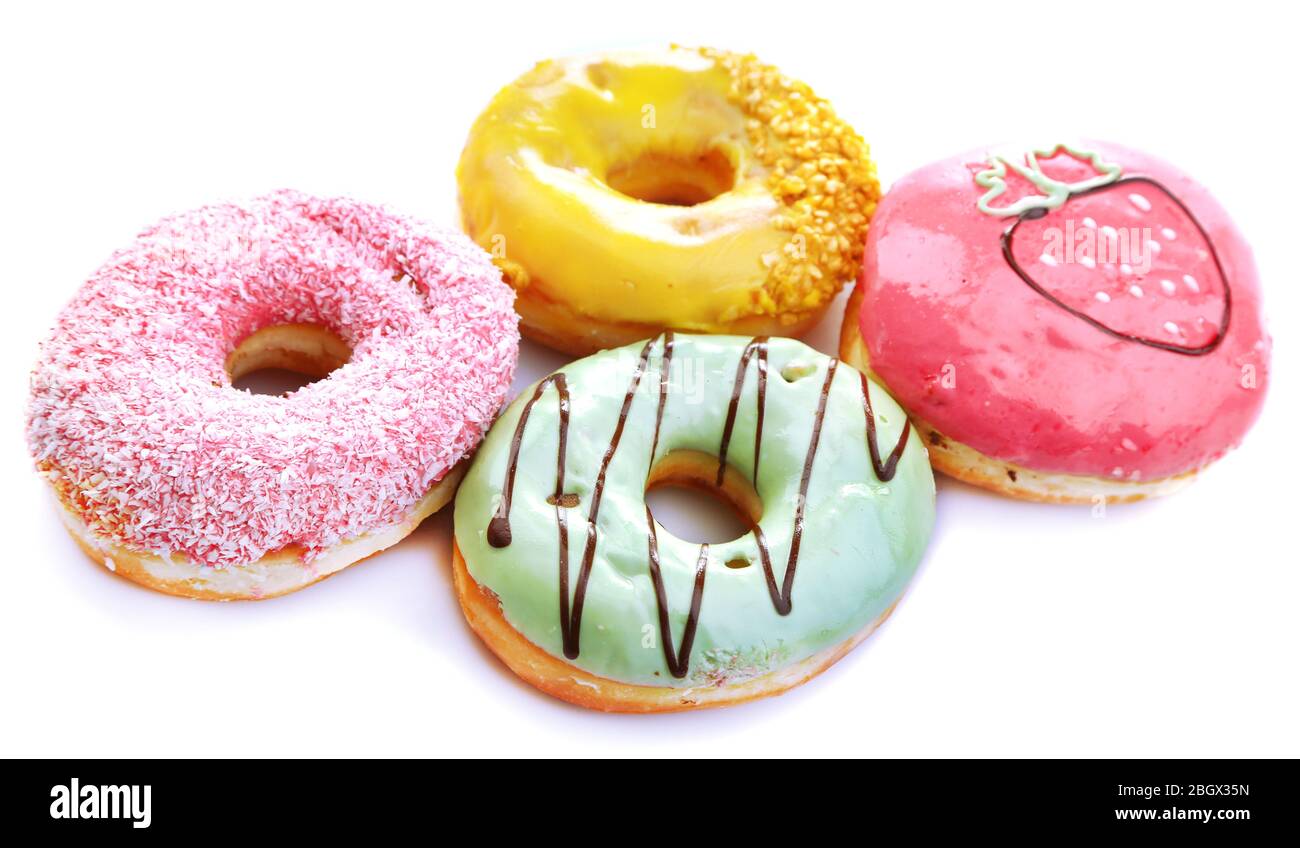 Delicious donuts with color glaze isolated on white Stock Photo - Alamy