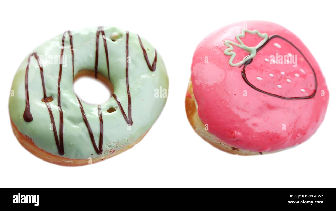 Delicious donuts with color glaze isolated on white Stock Photo - Alamy