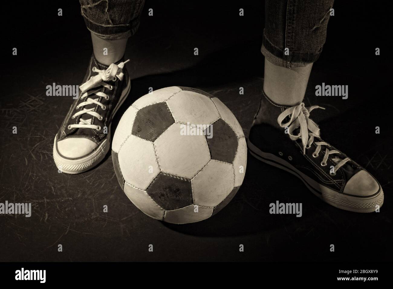 Soccer ball on black background Stock Photo - Alamy