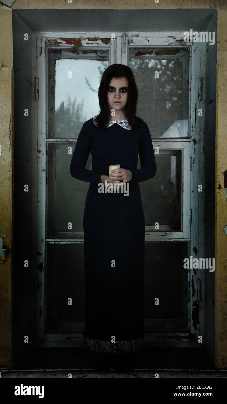 Horror Scene of with scary woman in long dress Stock Photo - Alamy