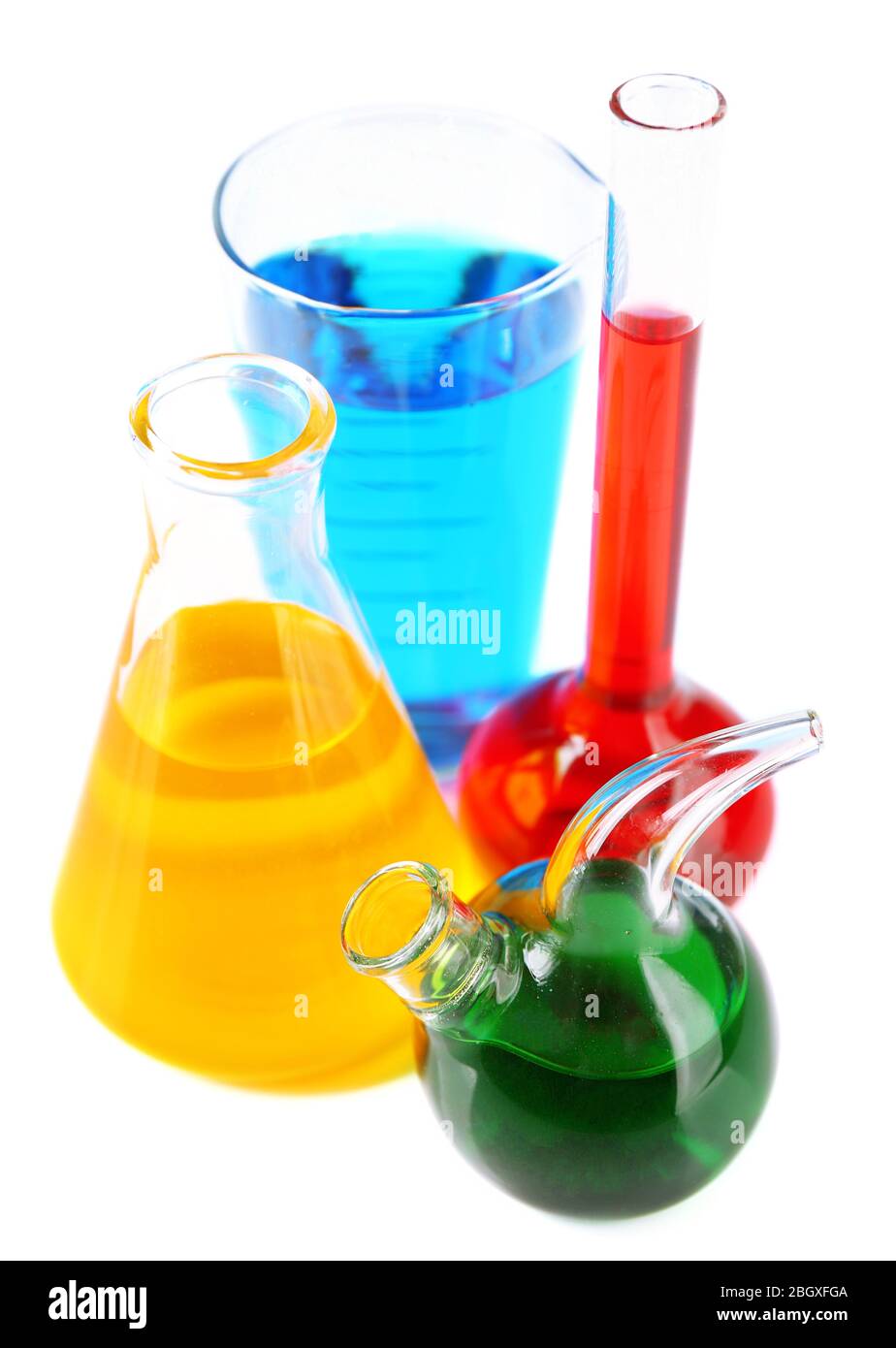 Different laboratory glassware with colorful liquid isolated on white