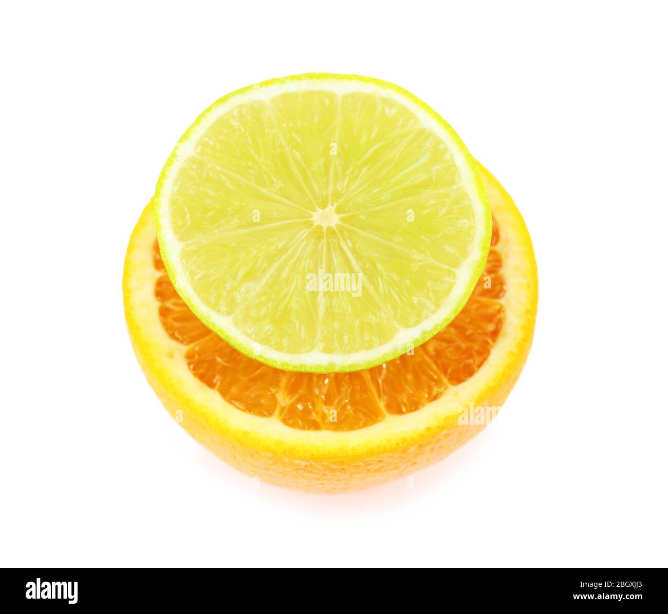 Fresh cut lime and orange isolated on white Stock Photo - Alamy