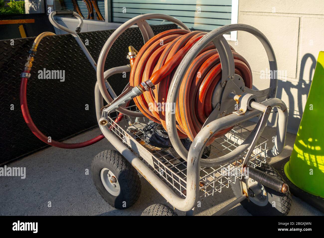 Garden hose reel hi-res stock photography and images - Alamy