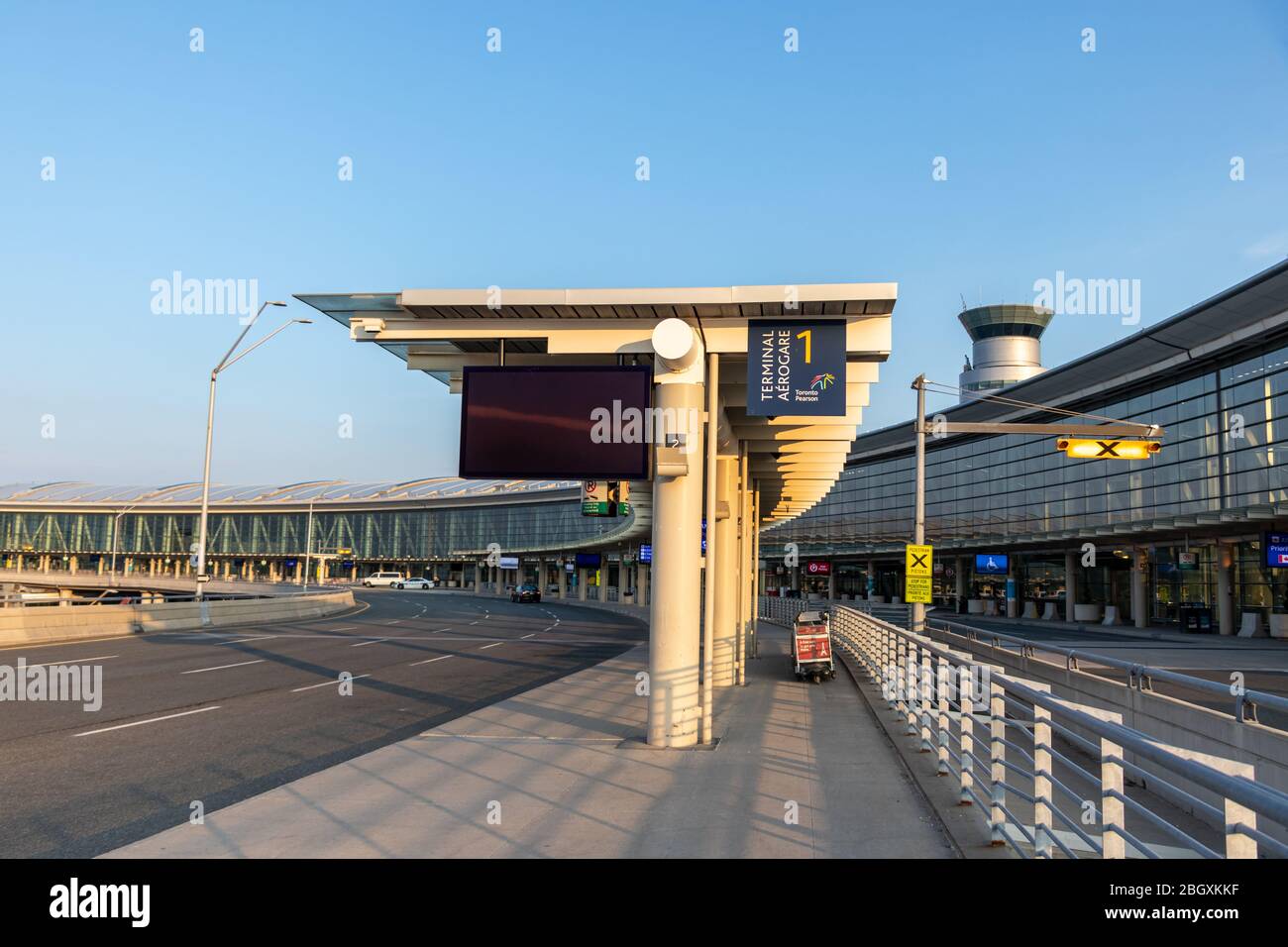 Empty Toronto Pearson Terminal 1 seen during the global COVID-19 pandemic on a sunny afternoon. Stock Photo