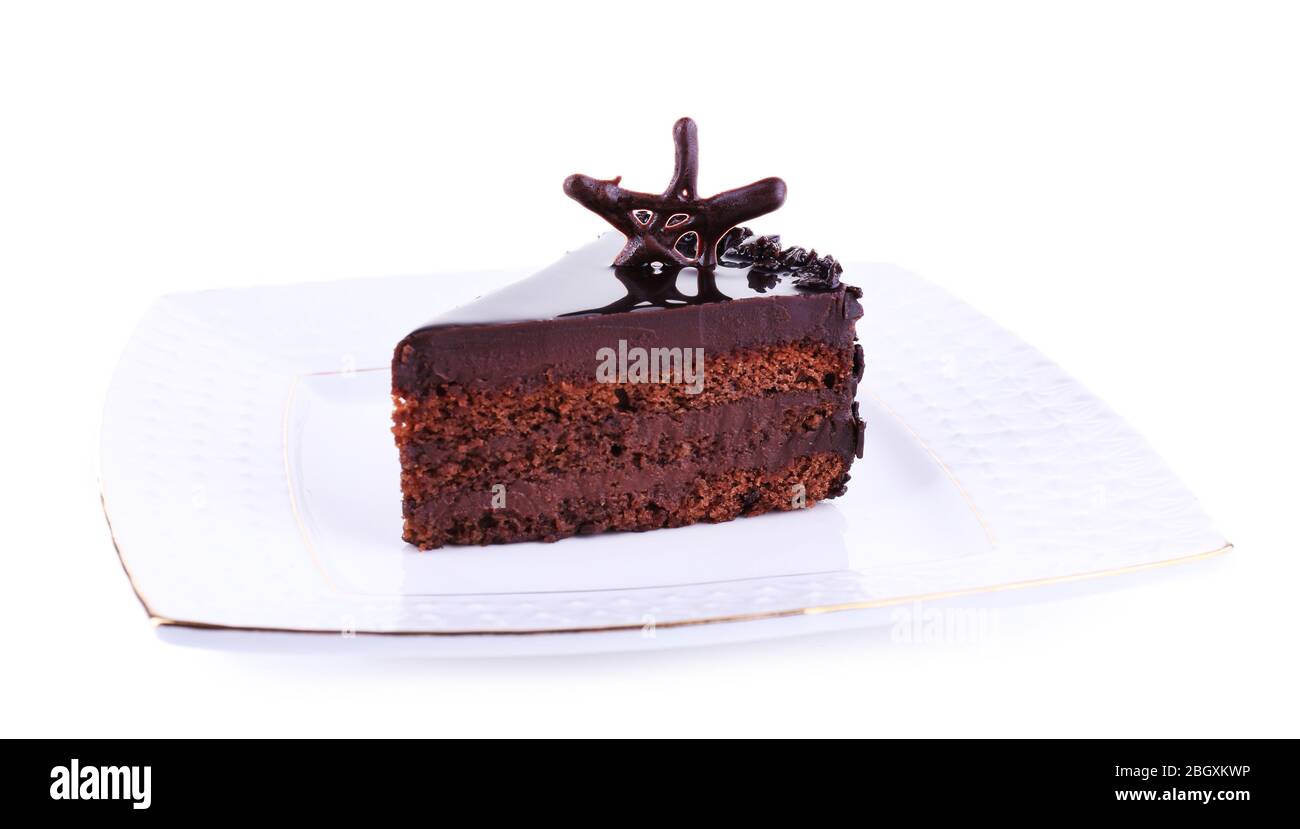 Delicious chocolate cake on plate isolated on white Stock Photo - Alamy