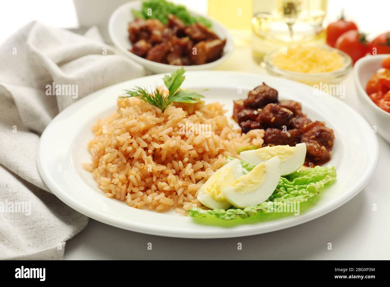Tasty rice served on table, close-up Stock Photo - Alamy