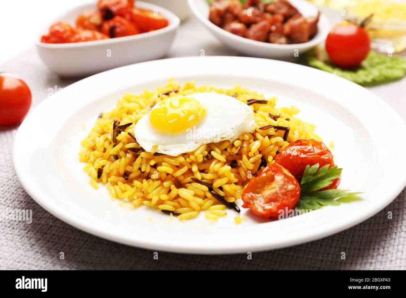 Tasty rice served on table, close-up Stock Photo - Alamy
