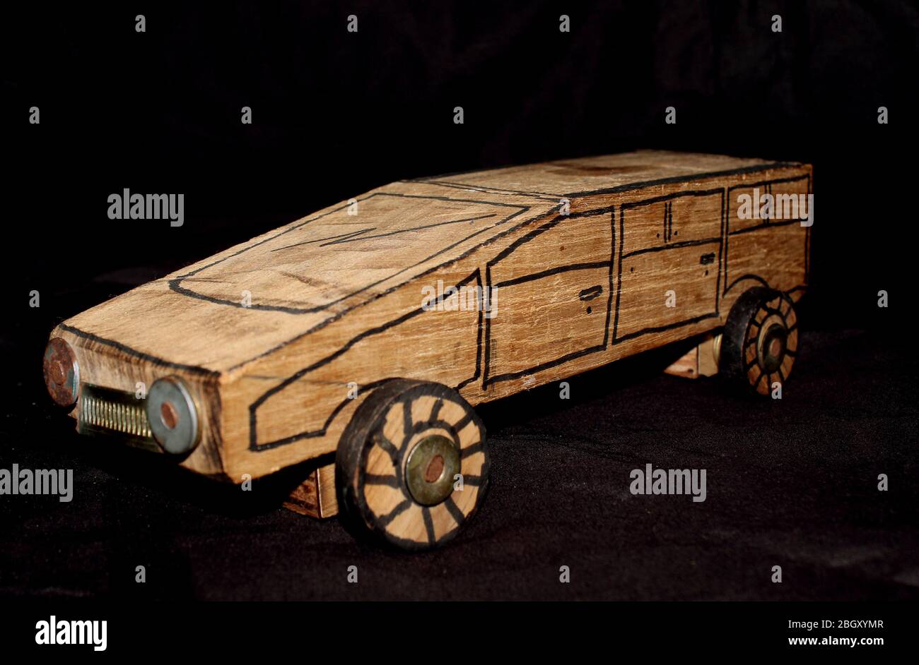 handmade wooden car toy for kids isolated on black background Stock ...