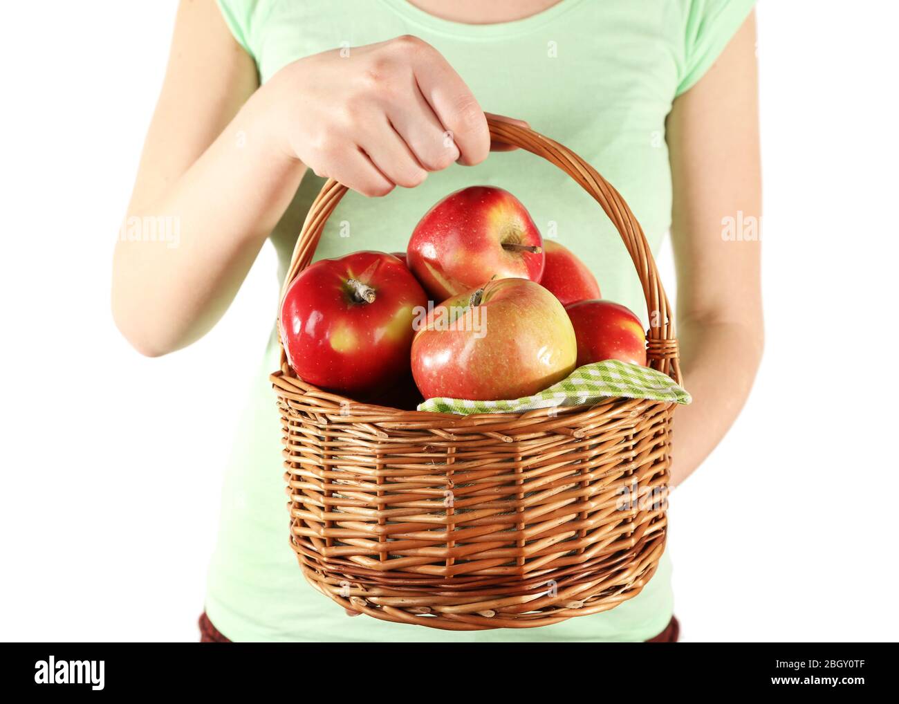 Hand holding wicker basket full hi-res stock photography and images - Alamy