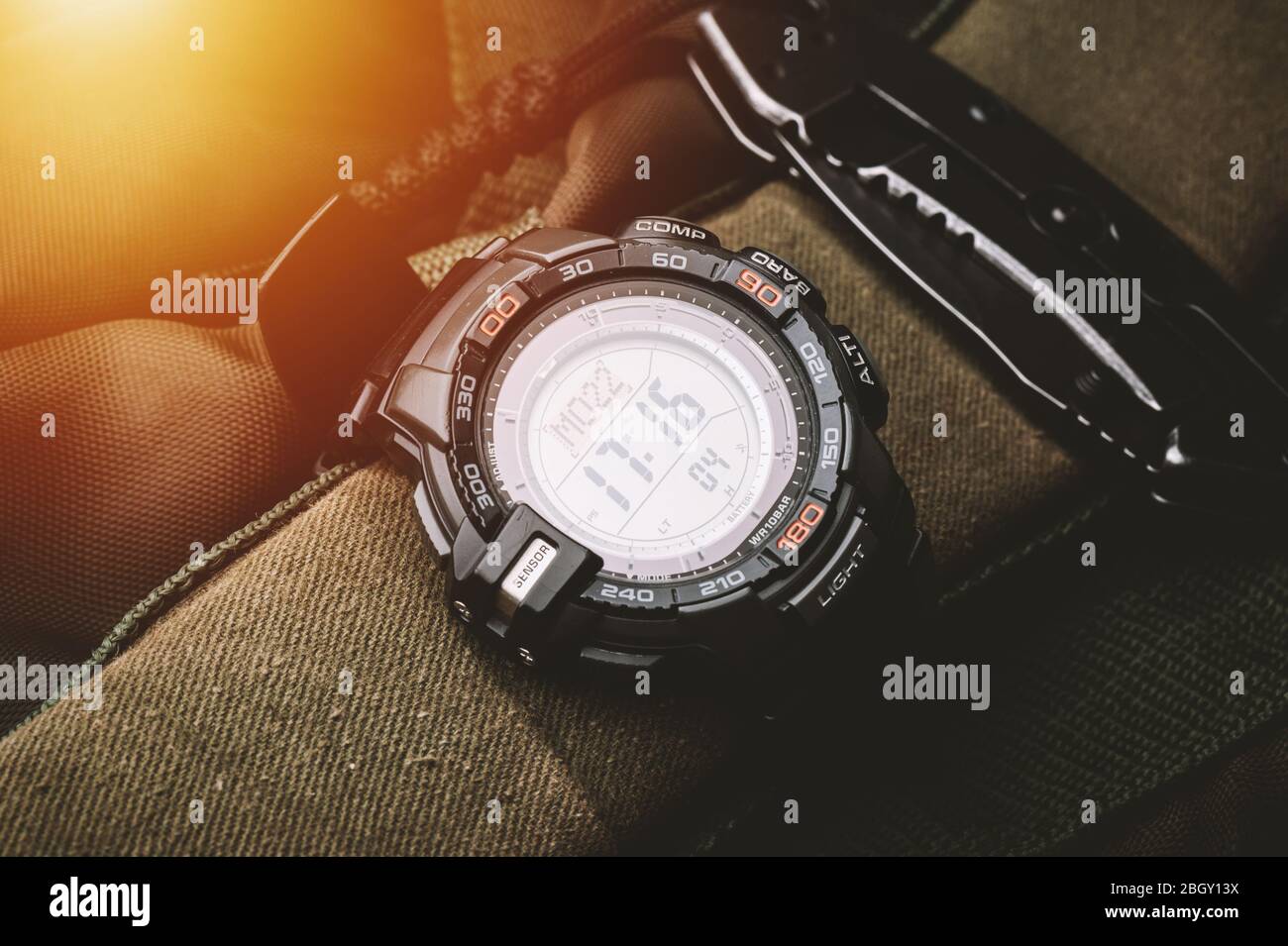 Black digital watch for outdoor activities with stopwatch feature