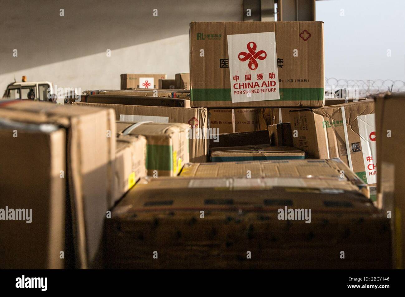 Dakar, Senegal. 20th Apr, 2020. The second batch of medical aids offered by Chinese government is pictured at Blaise Diagne International Airport in Dakar, Senegal, April 20, 2020. The second batch of medical aids offered by Chinese government to Senegal was received Wednesday by Senegalese Minister of Health and Social Action Abdoulaye Diouf Sarr in Dakar. Credit: Eddy Peters/Xinhua/Alamy Live News Stock Photo