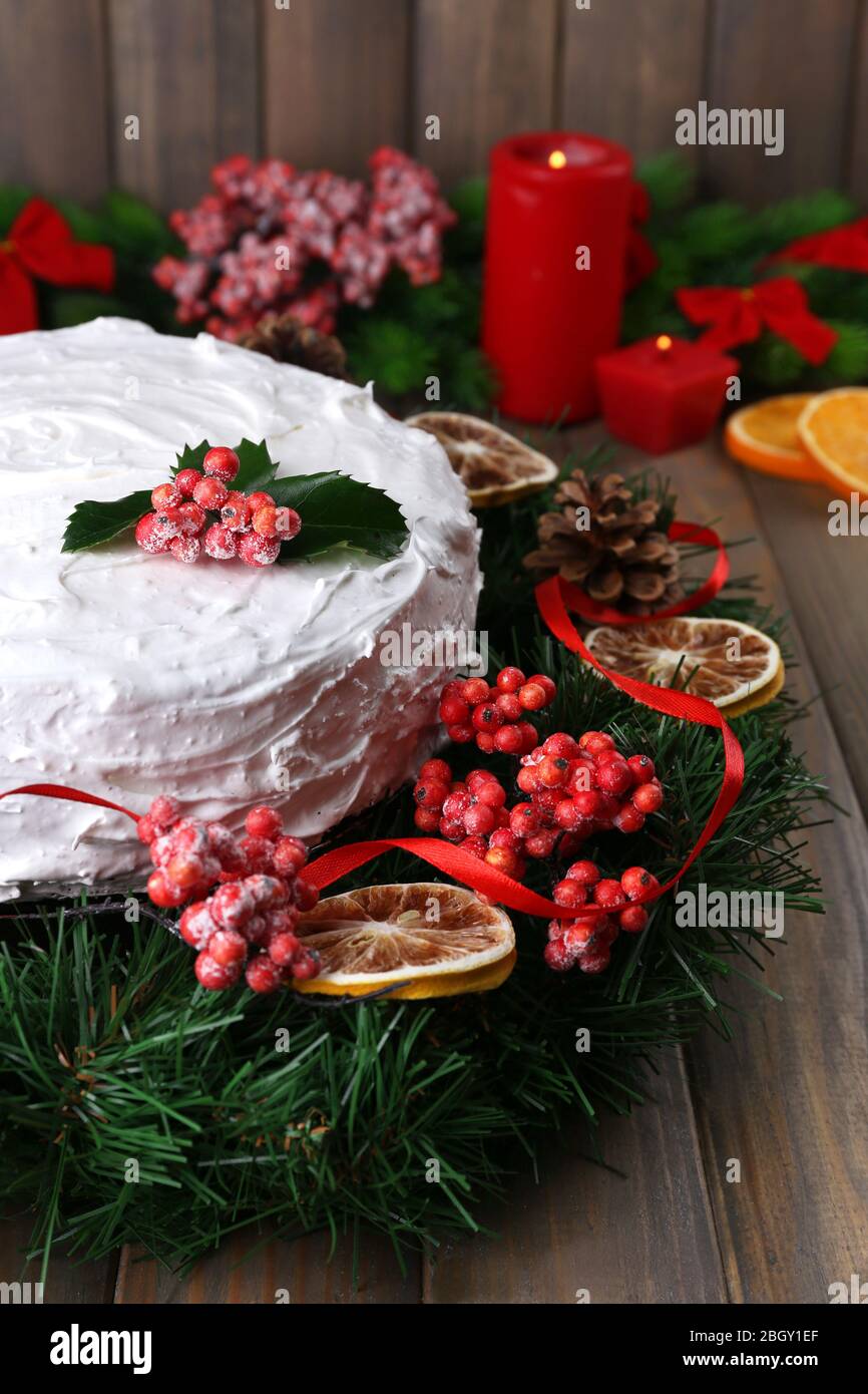Christmas Cake With Wreath On Wooden Background Stock Photo Alamy