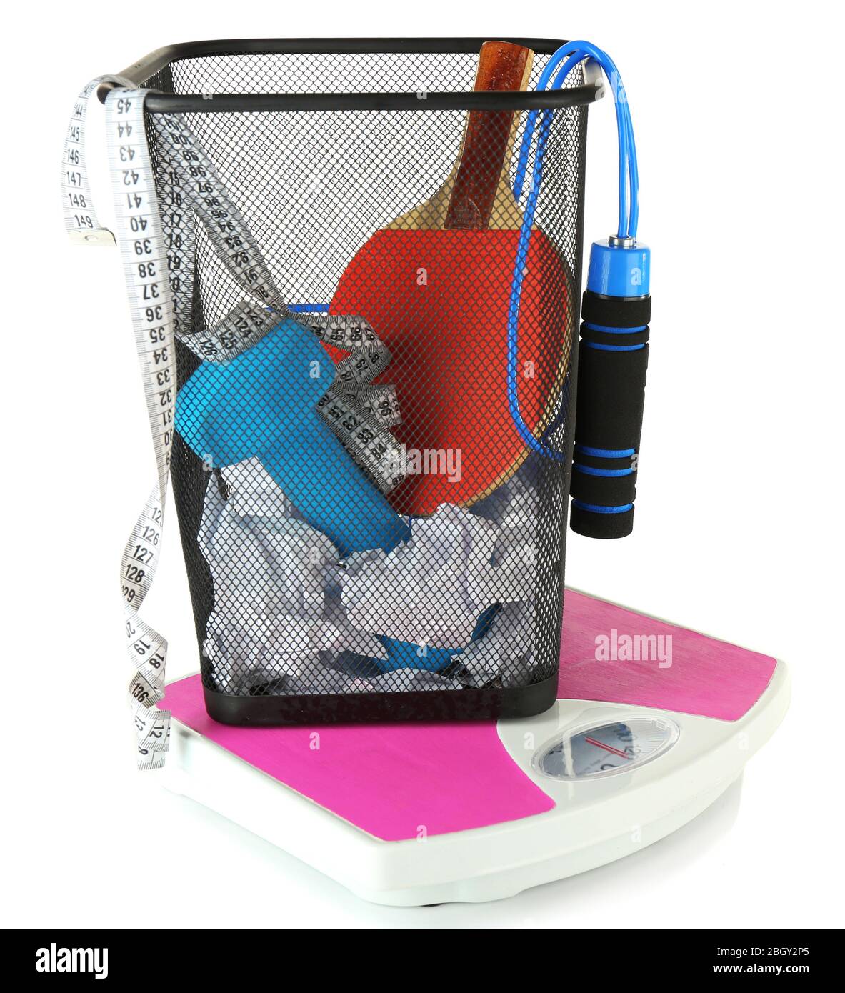Metal trash bin with sport equipment, crumpled paper and weight scale