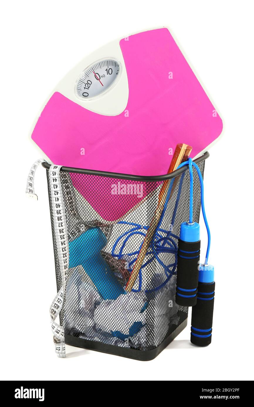 Metal trash bin with sport equipment, crumpled paper and weight scale