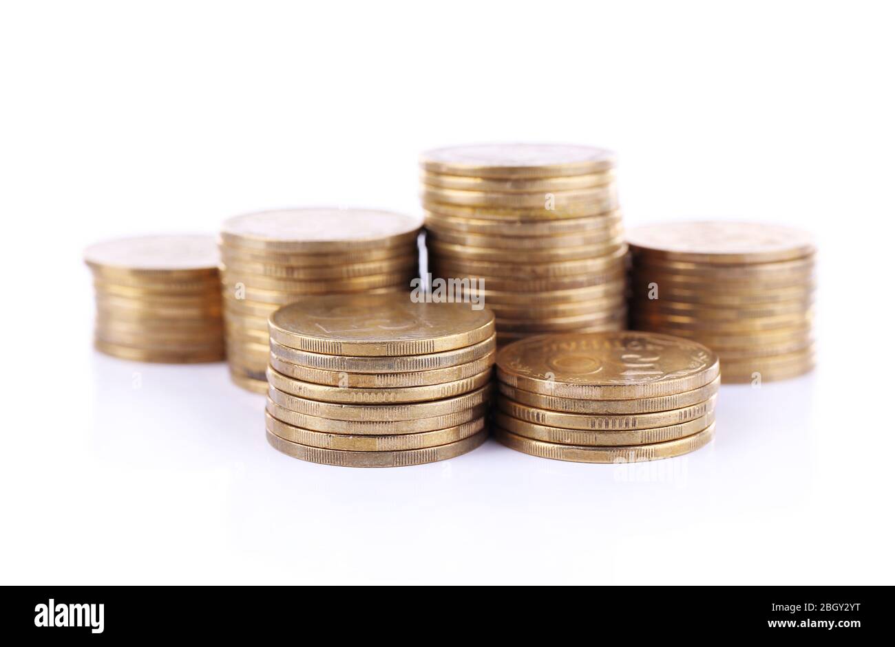Pile of coins isolated on white background Stock Photo - Alamy