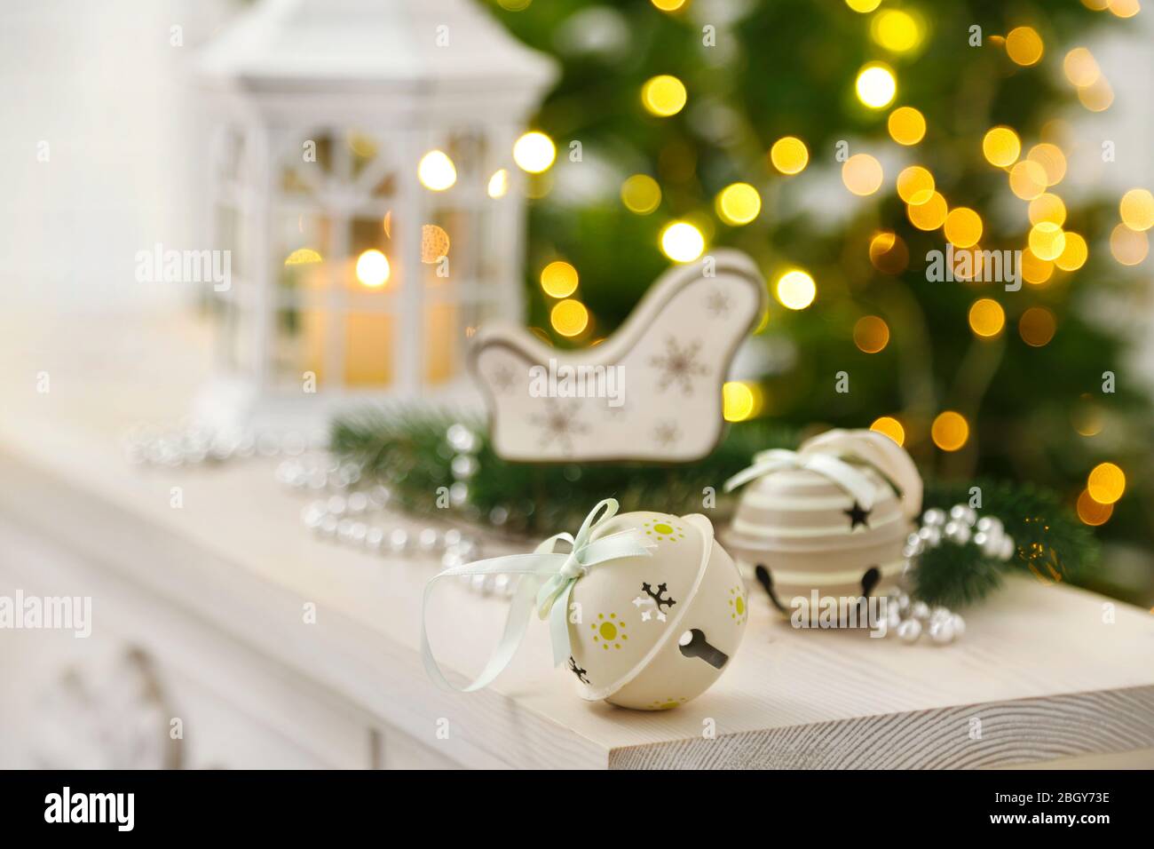 Christmas decorations with lantern on fir tree background Stock Photo ...