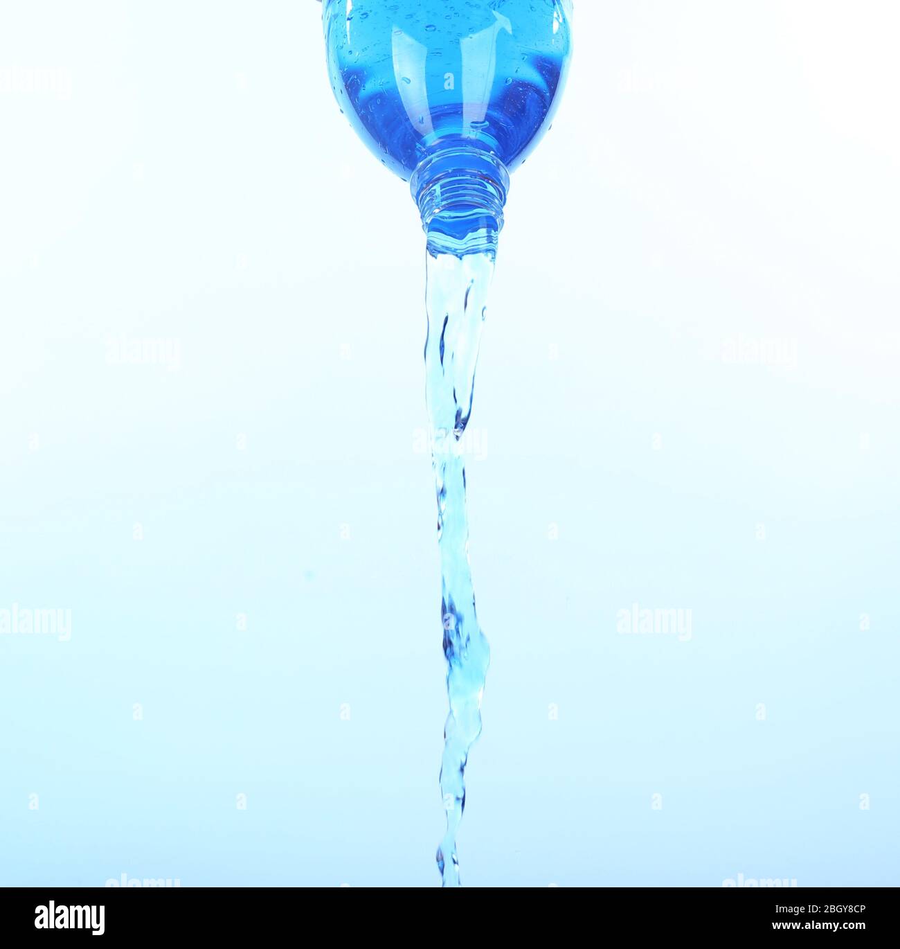 Water pouring from bottle Stock Photo Alamy