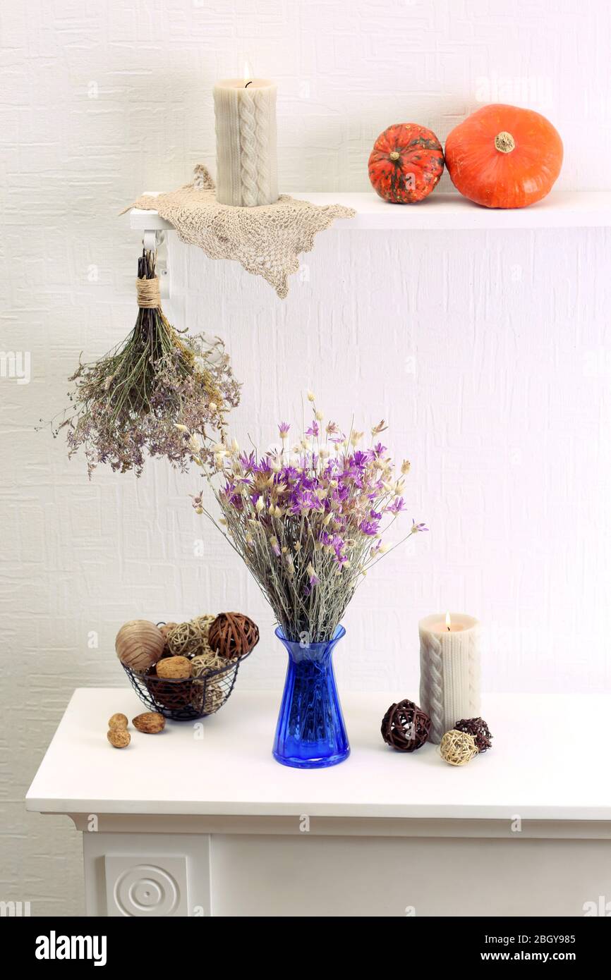 Composition of dried flowers on white wall background Stock Photo - Alamy