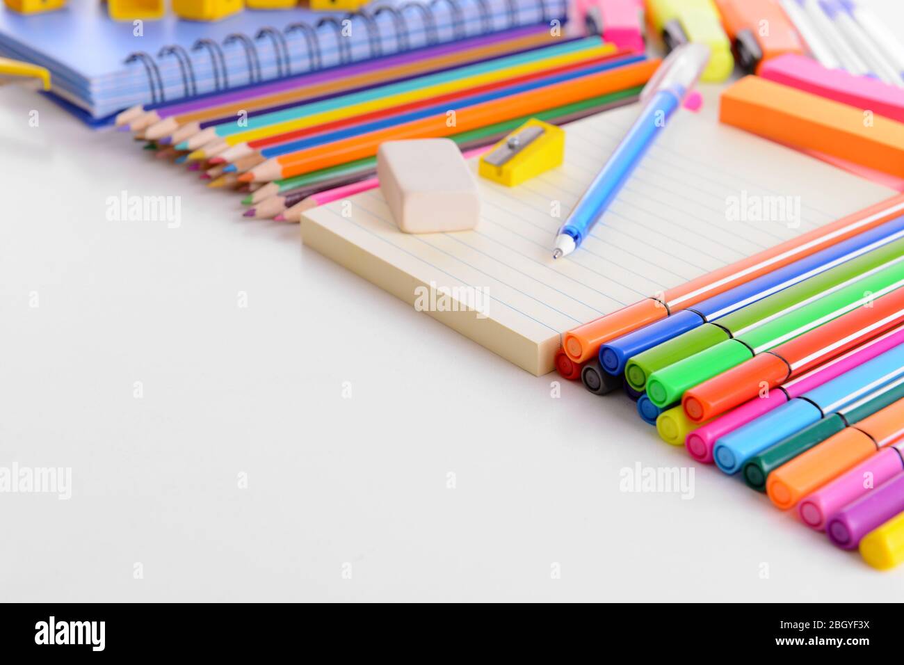 School stationery isolated on white Stock Photo - Alamy