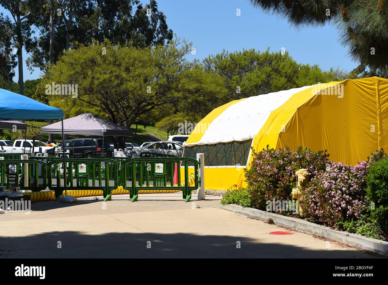 IRVINE, CALIFORNIA - 22 APRIL 2020: Tent for Drive-thru medical testing during the COVID19 pandemic, at the Gottschalk Medical Plaza on the Campus of Stock Photo