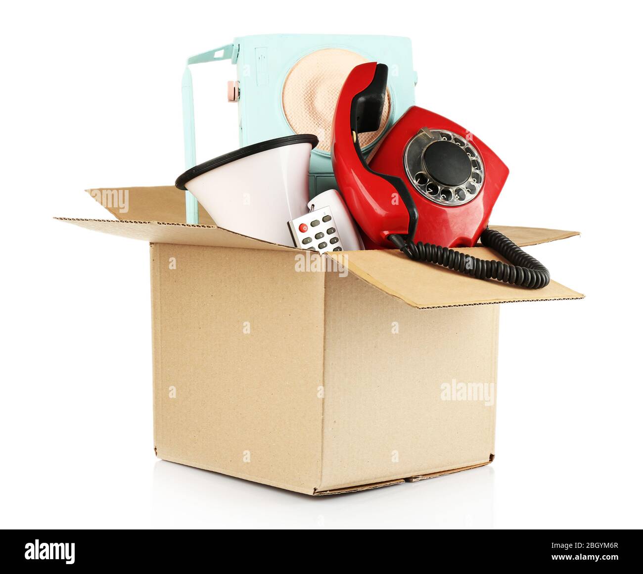 Box of unwanted stuff isolated on white Stock Photo Alamy