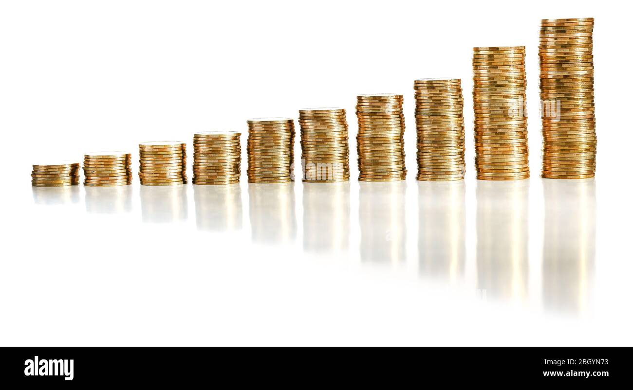 Pile of coins isolated on white Stock Photo - Alamy