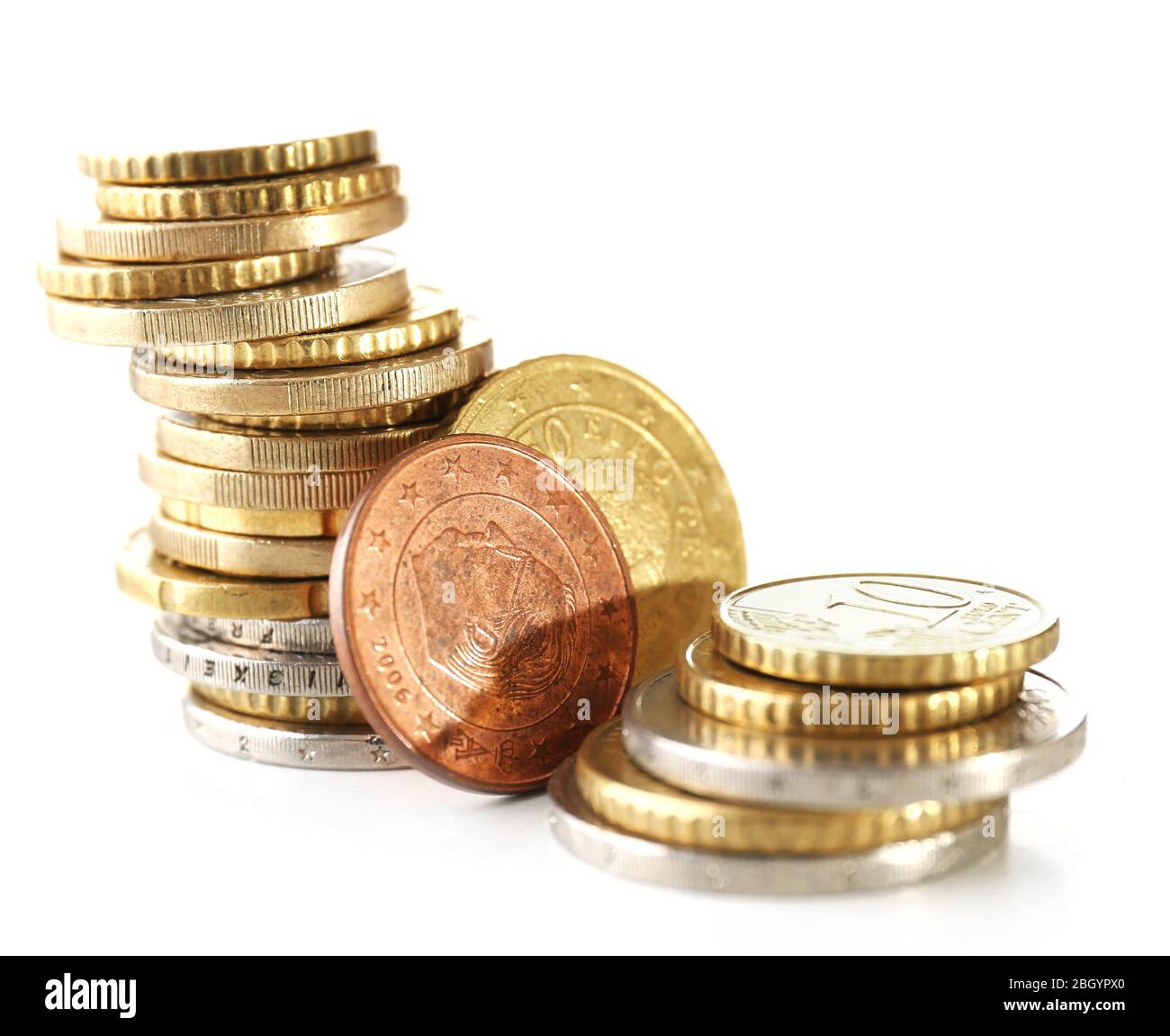 Pile of coins isolated on white Stock Photo - Alamy
