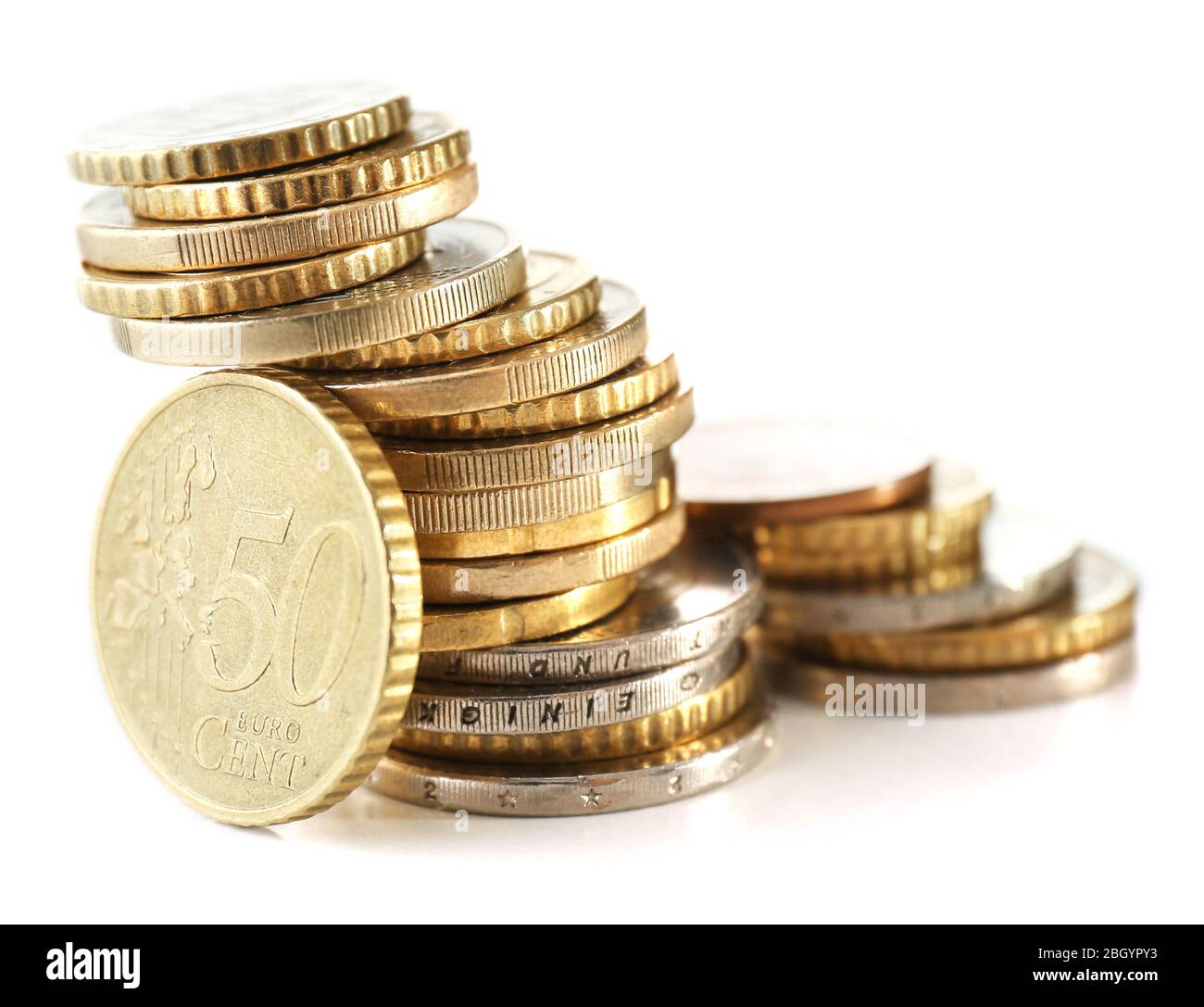 Pile of coins isolated on white Stock Photo - Alamy
