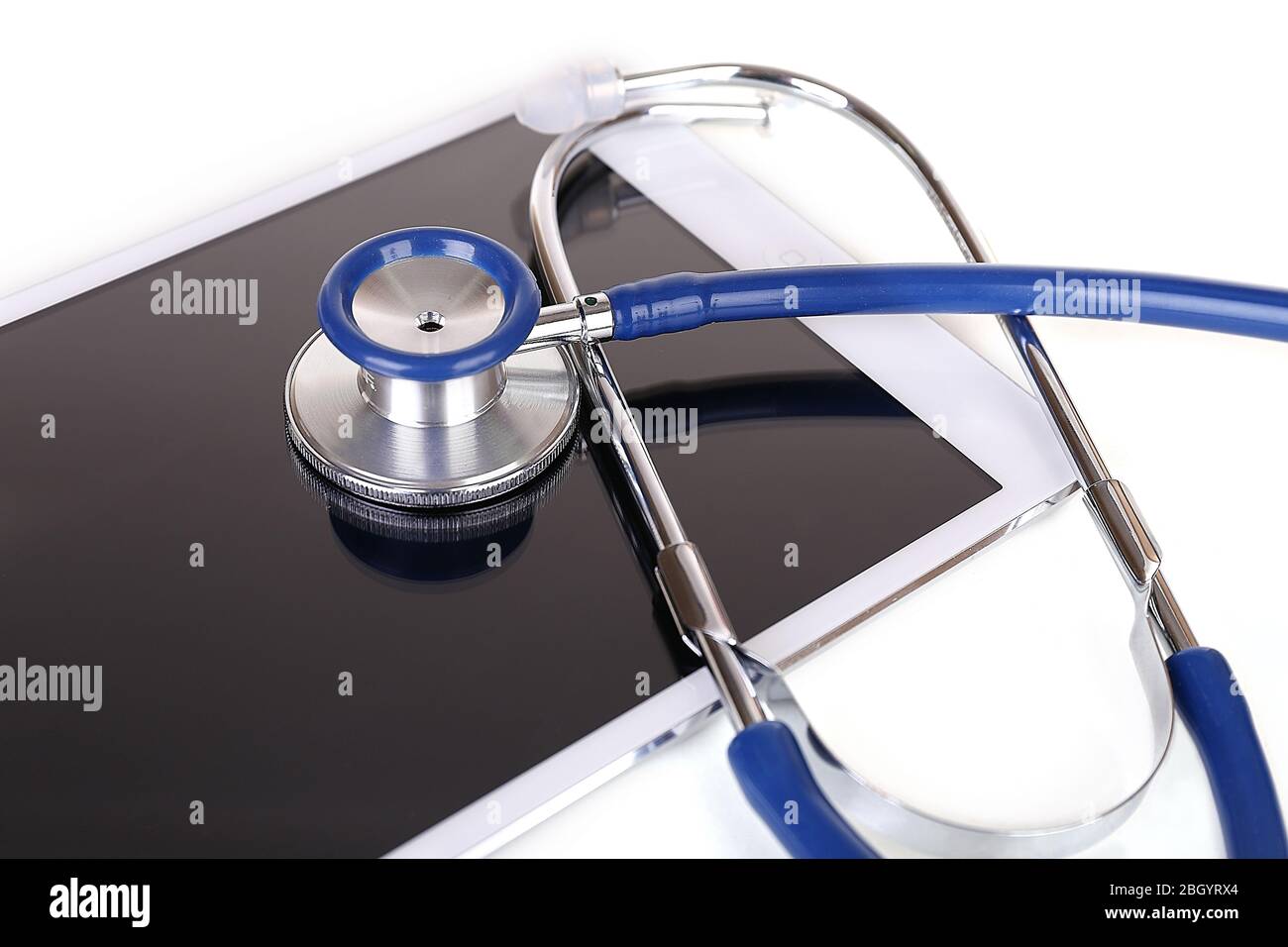 Tablet and blue stethoscope isolated on white Stock Photo - Alamy