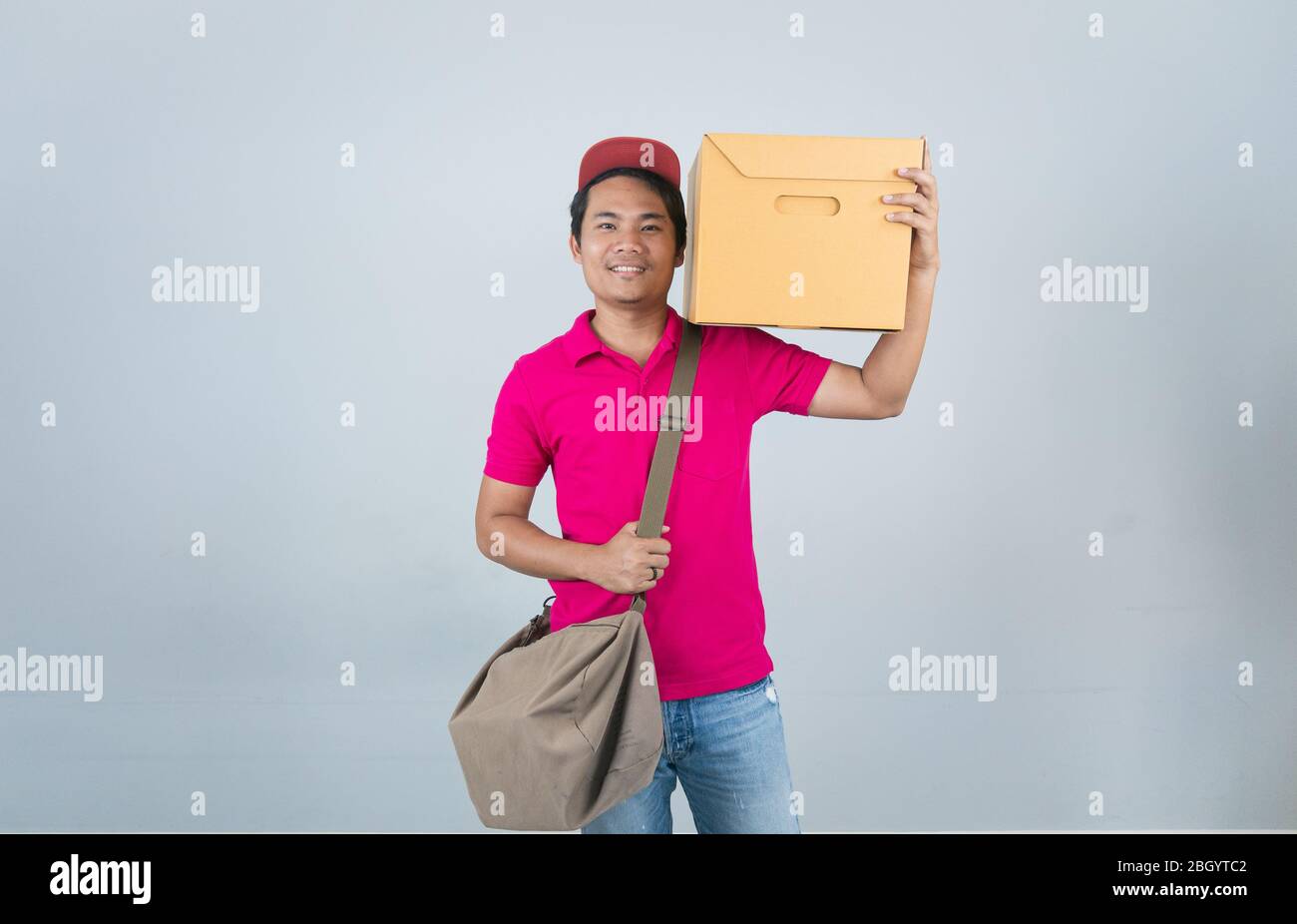 Young Asian Men delivery Services Carrying parcels on the chase and